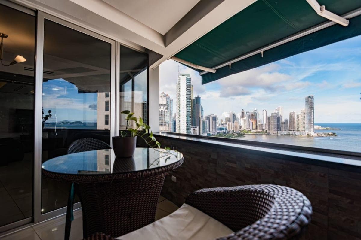 Covered terrace of a Marina Terrace penthouse with bay and Punta Paitilla skyline views, Bella Vista, Panama City