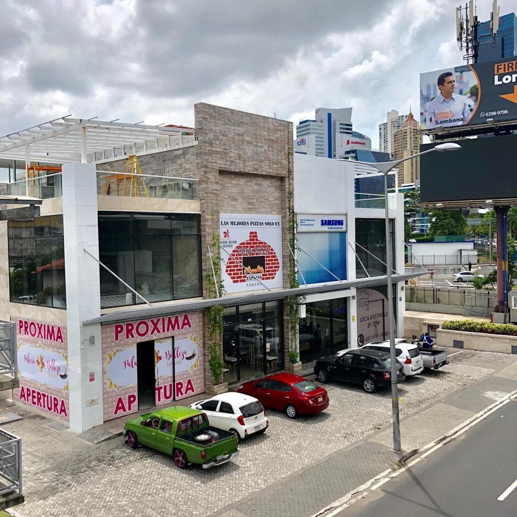 Plaza Brasil commercial units with glass storefronts before opening, Via Brasil, Panama City
