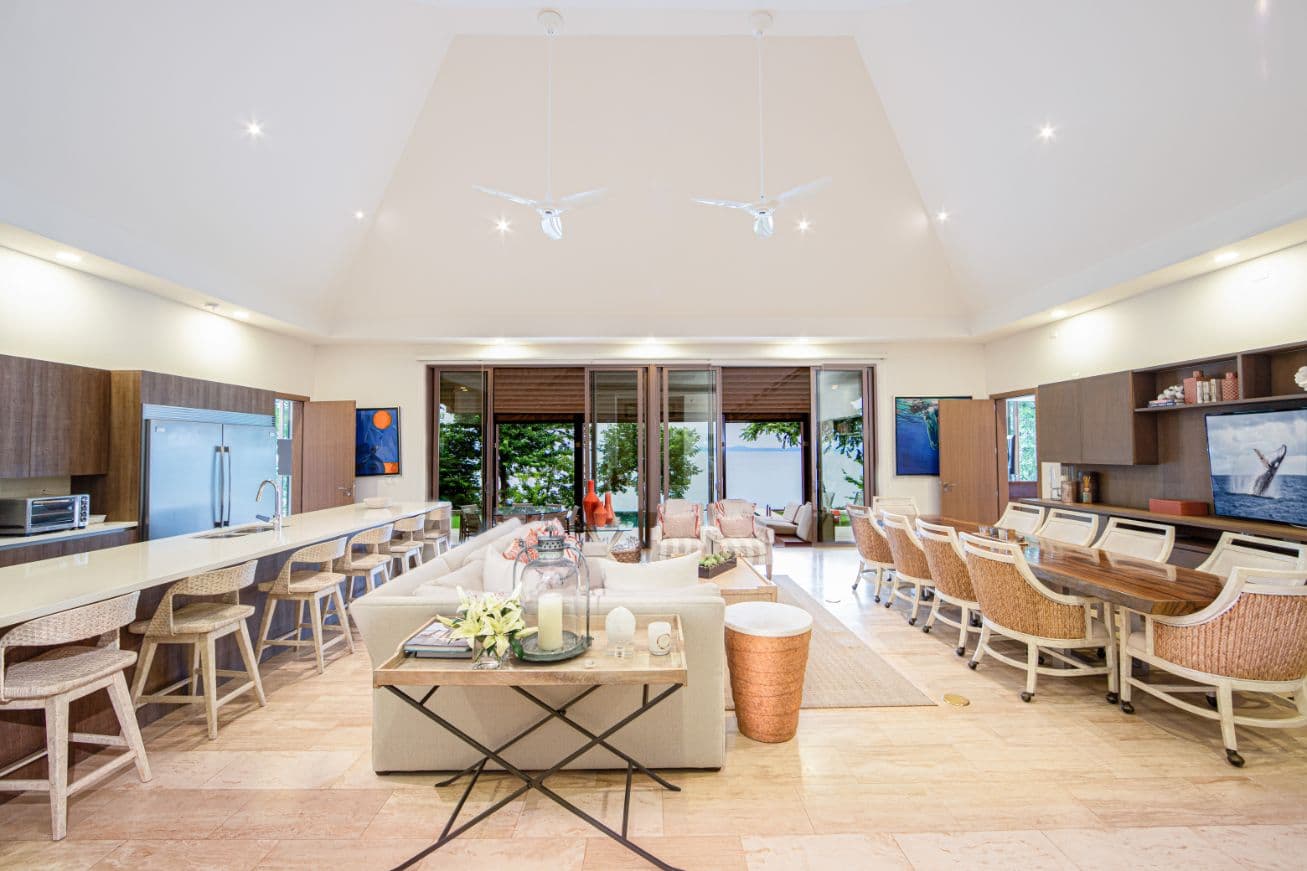 Great room with vaulted ceiling, kitchen and dining at a La Peninsula Villa