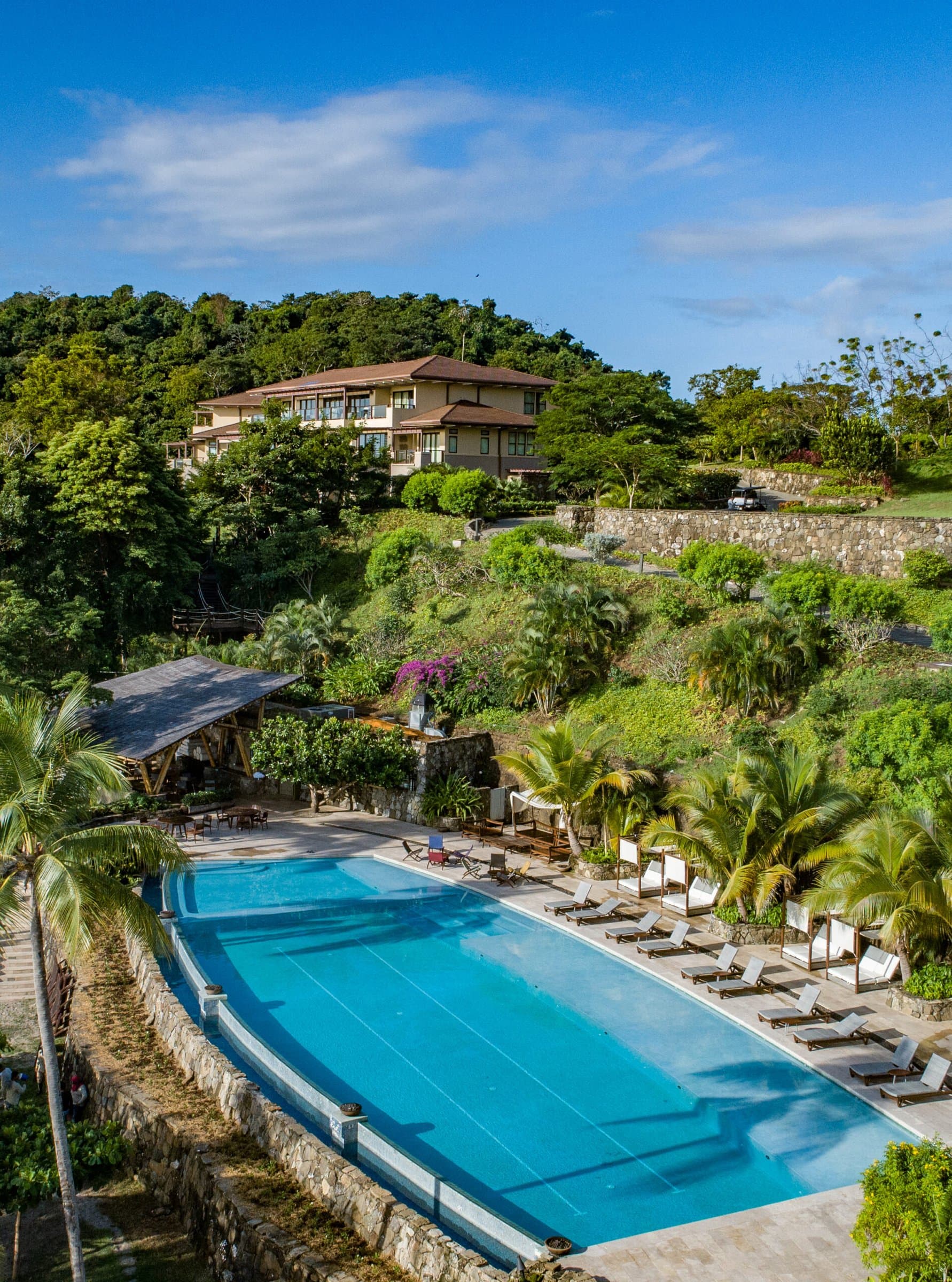 La Peninsula Club Residences overlooking the Beach Club pool on Pearl Island