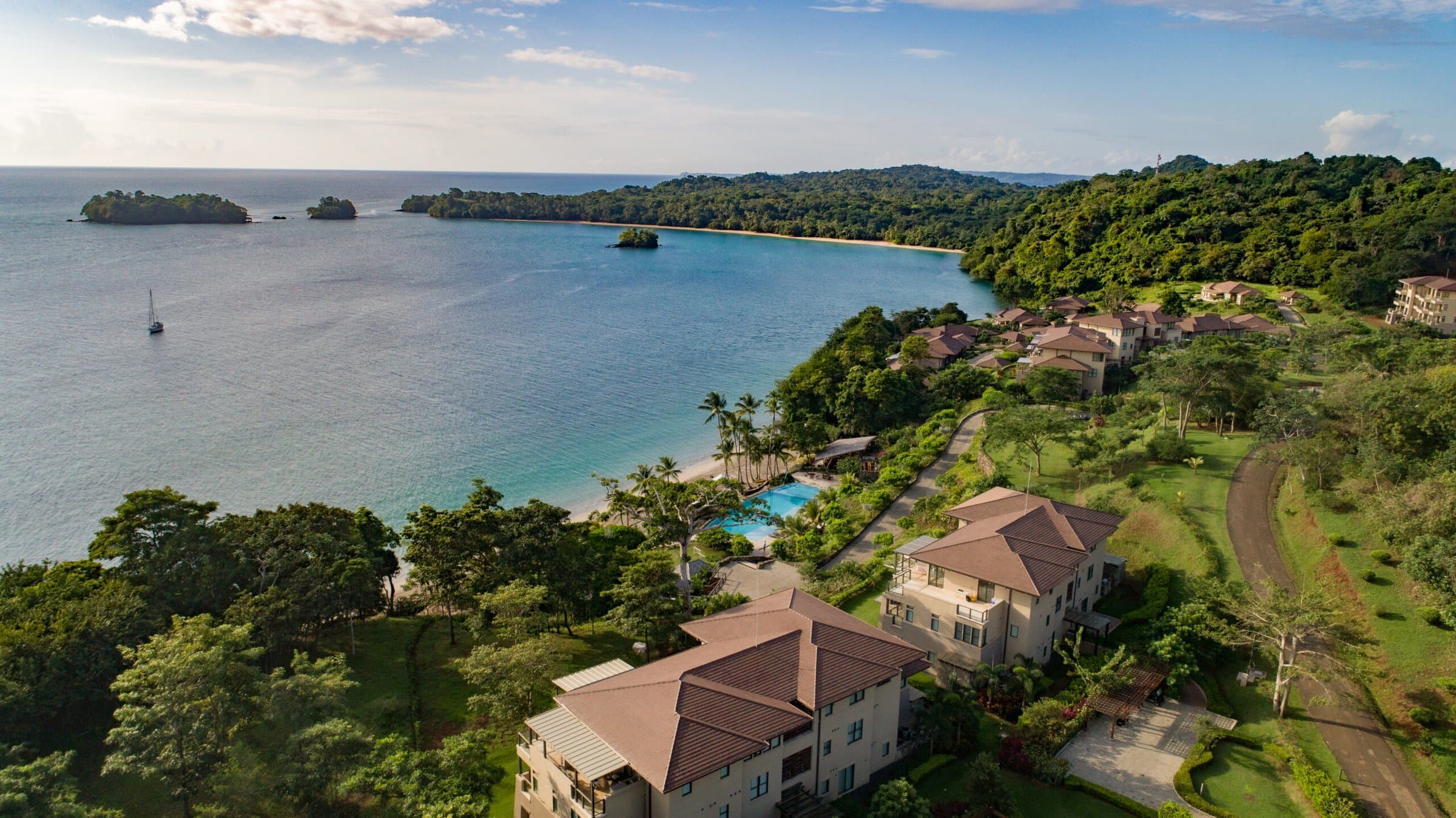 Aerial view of the La Peninsula Club Residences above the bay on Pearl Island