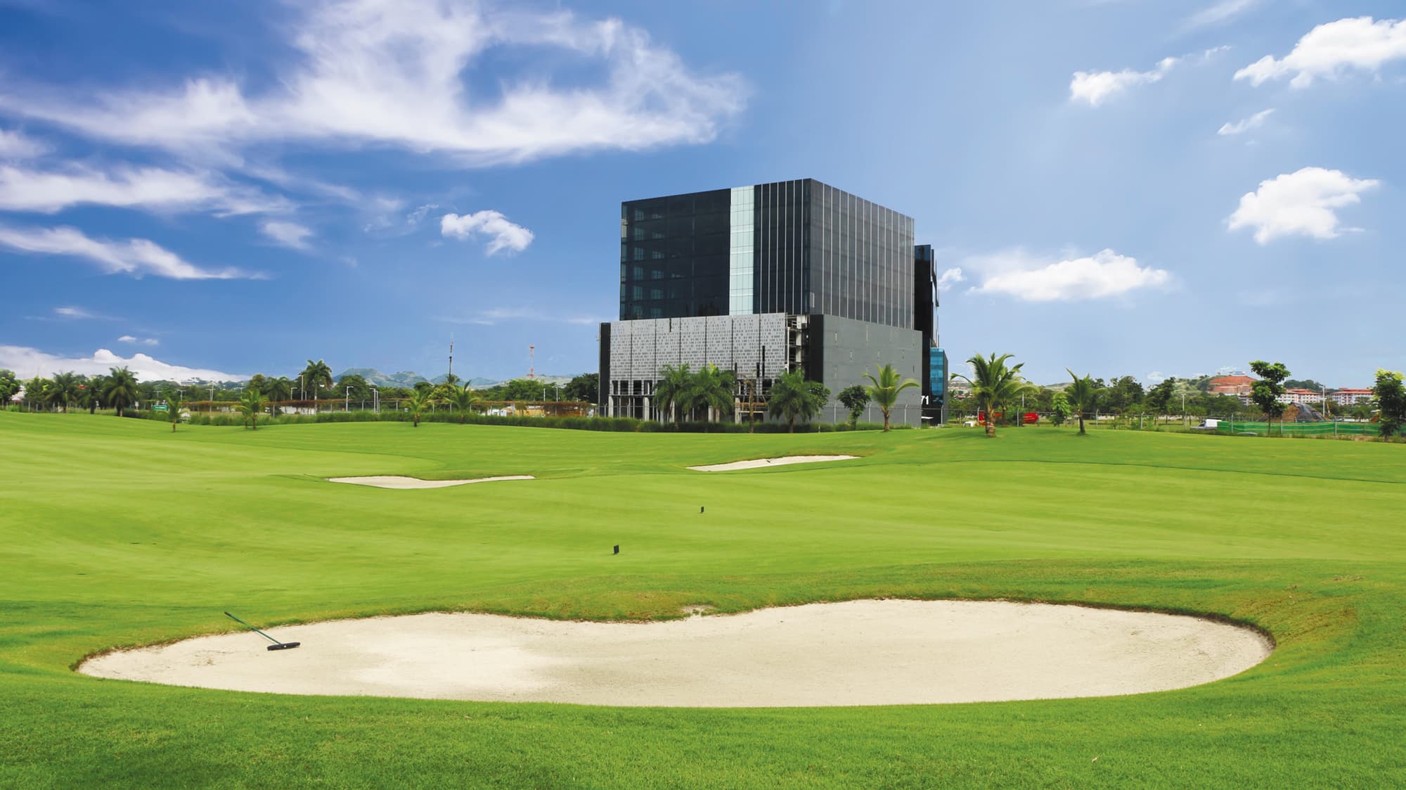 PH Arifa office building seen across the Santa Maria golf course