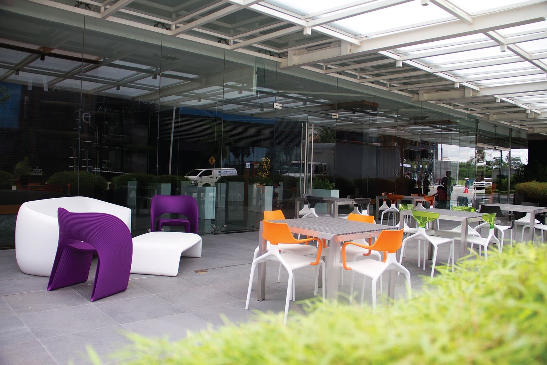 Shared terrace lounge with colorful seating at PH Arifa