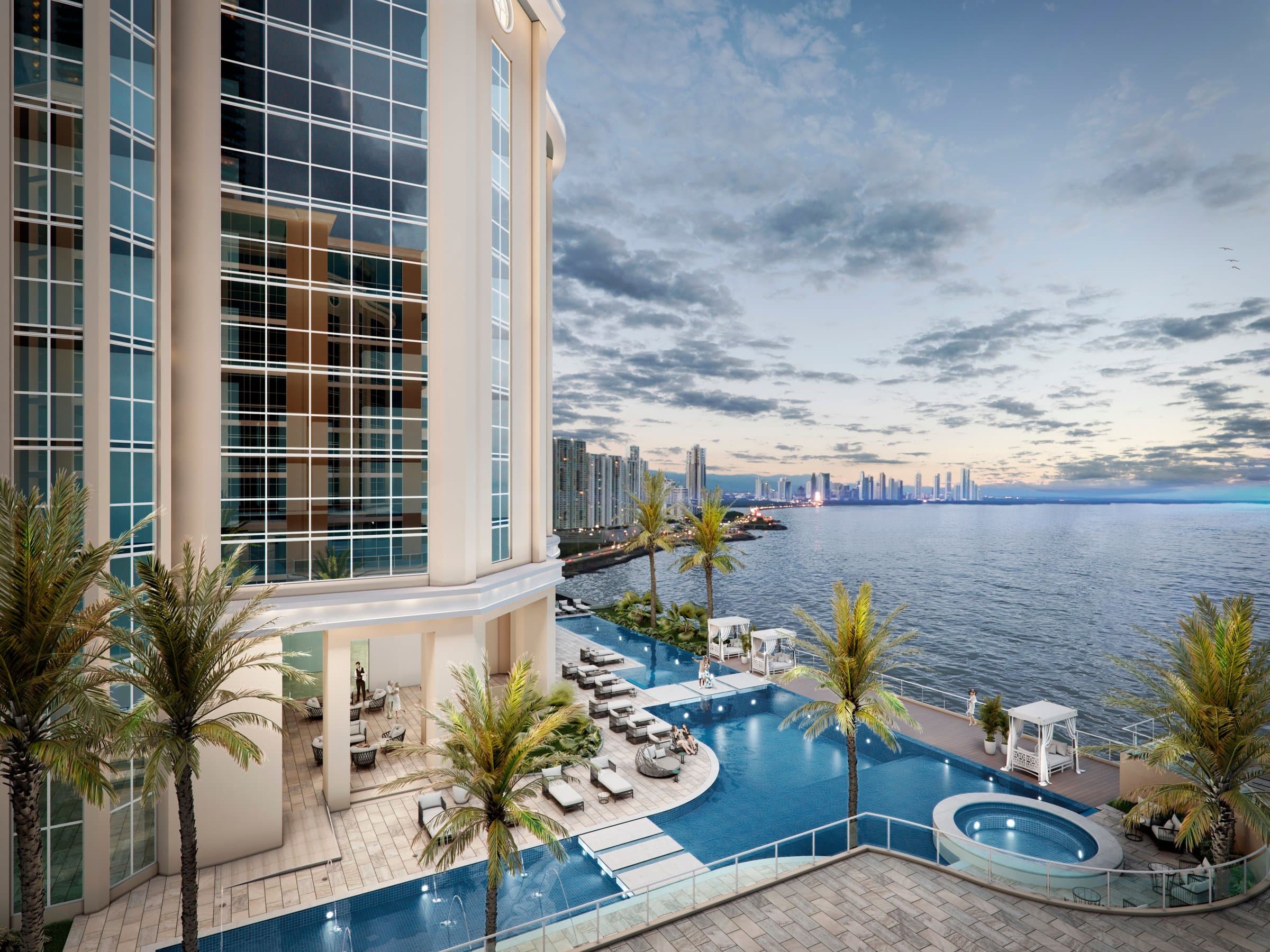 Oceanfront pool with jacuzzi and palm trees beside Pacific Point Torre 400
