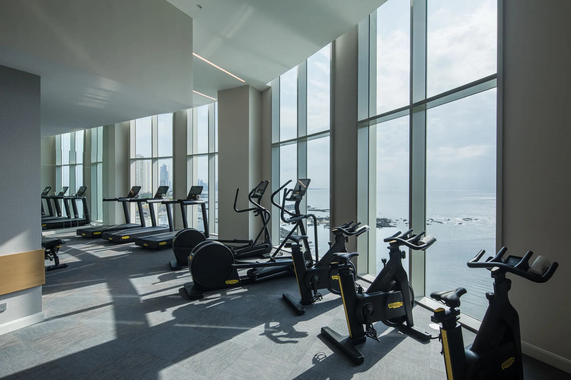 Fitness center with ocean views at Pacific Point Torre 400