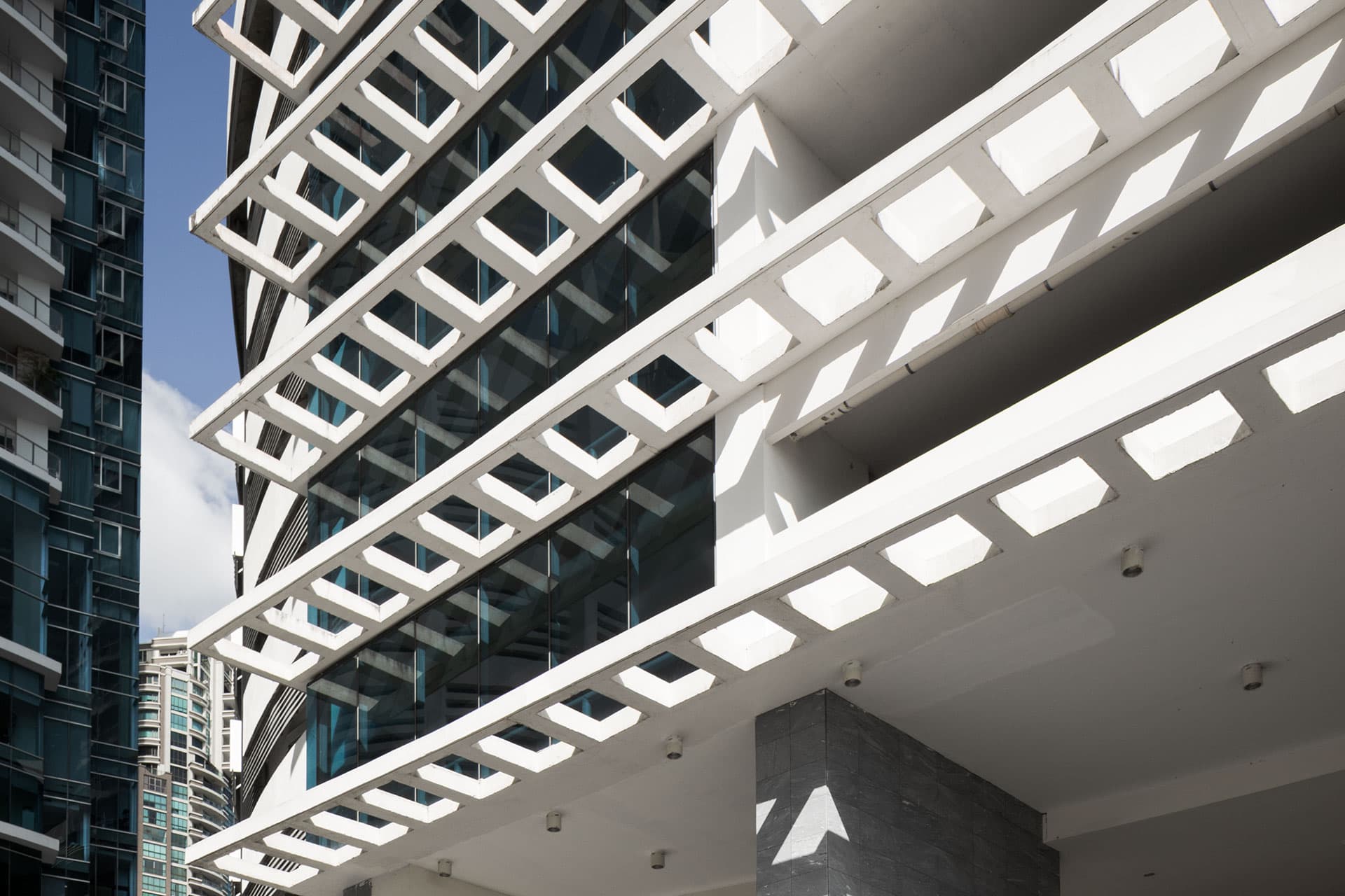 White lattice balconies on the facade of Grand Tower in Punta Pacifica