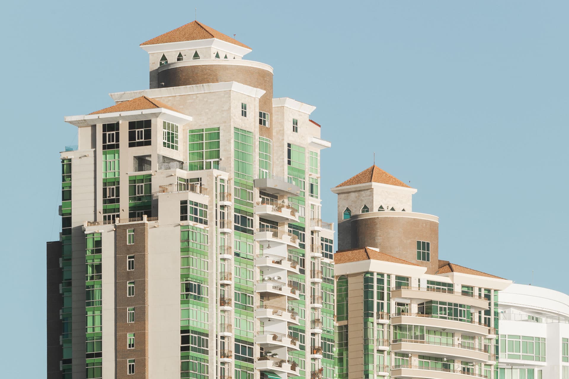 Tower tops with terracotta roofs at the Pacific Point urbanization