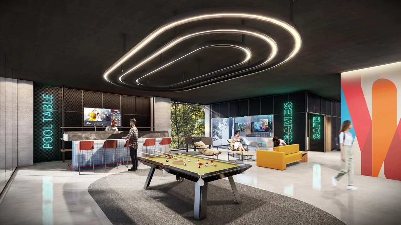Game room with pool table and neon lighting at Galería Towers