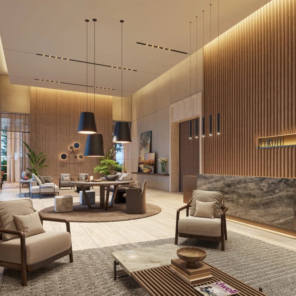 Lobby lounge with wood-slat walls at Corotú