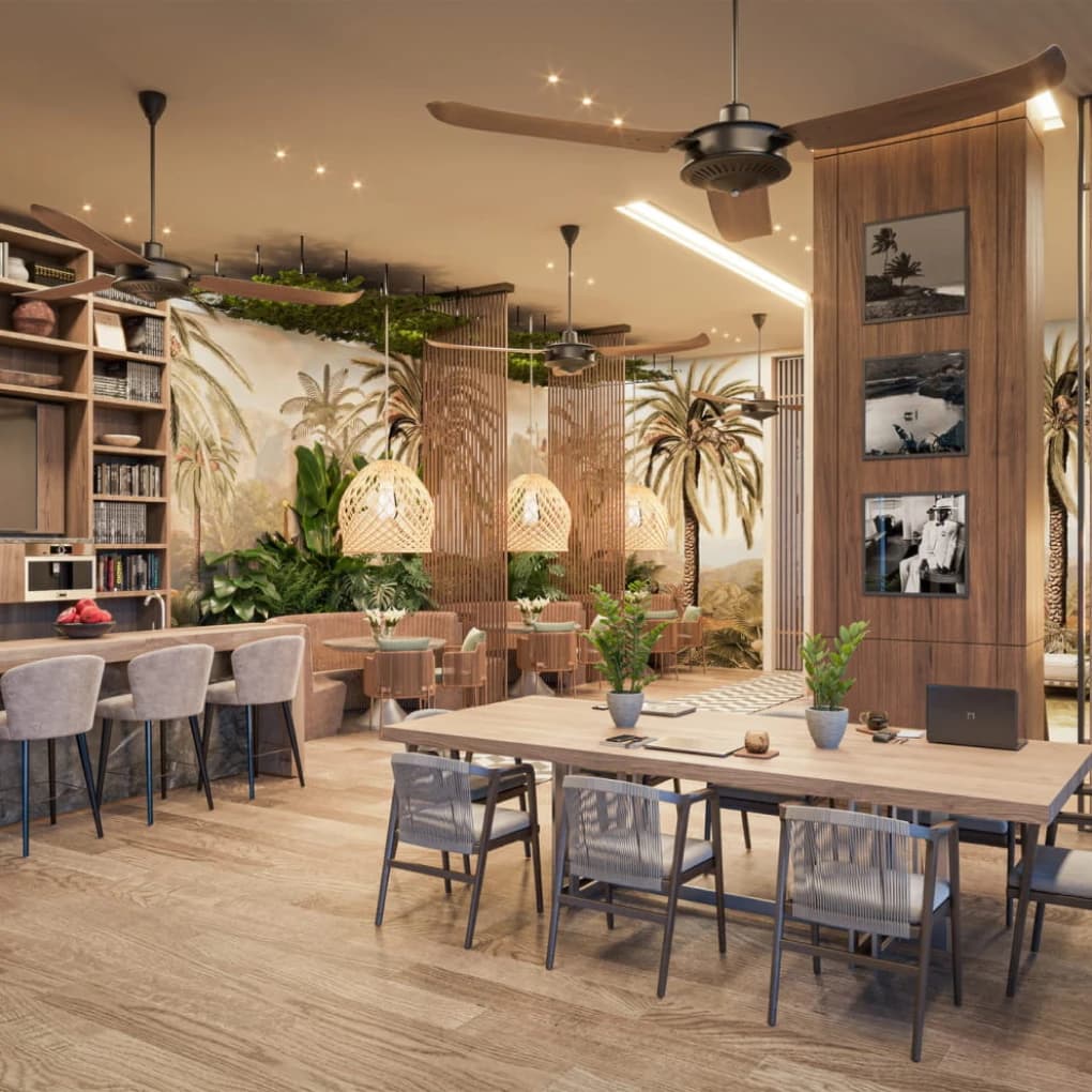 Coworking and adult lounge with communal table at Corotú