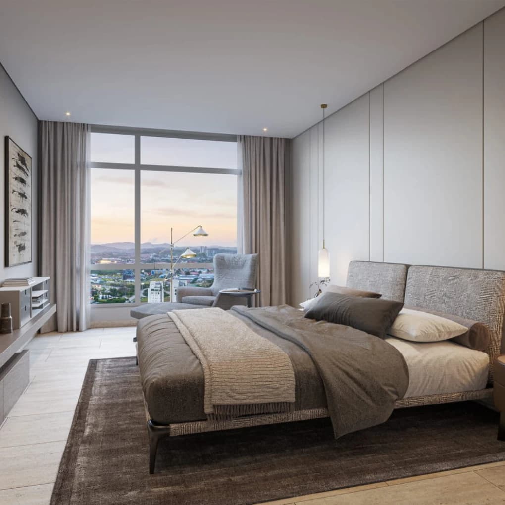 Primary bedroom with floor-to-ceiling window at Corotú