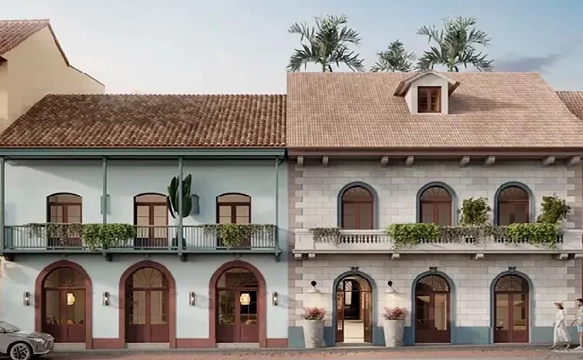 Rendering of the restored Patio San Miguel facade with arched doors and balconies on a Casco Antiguo street