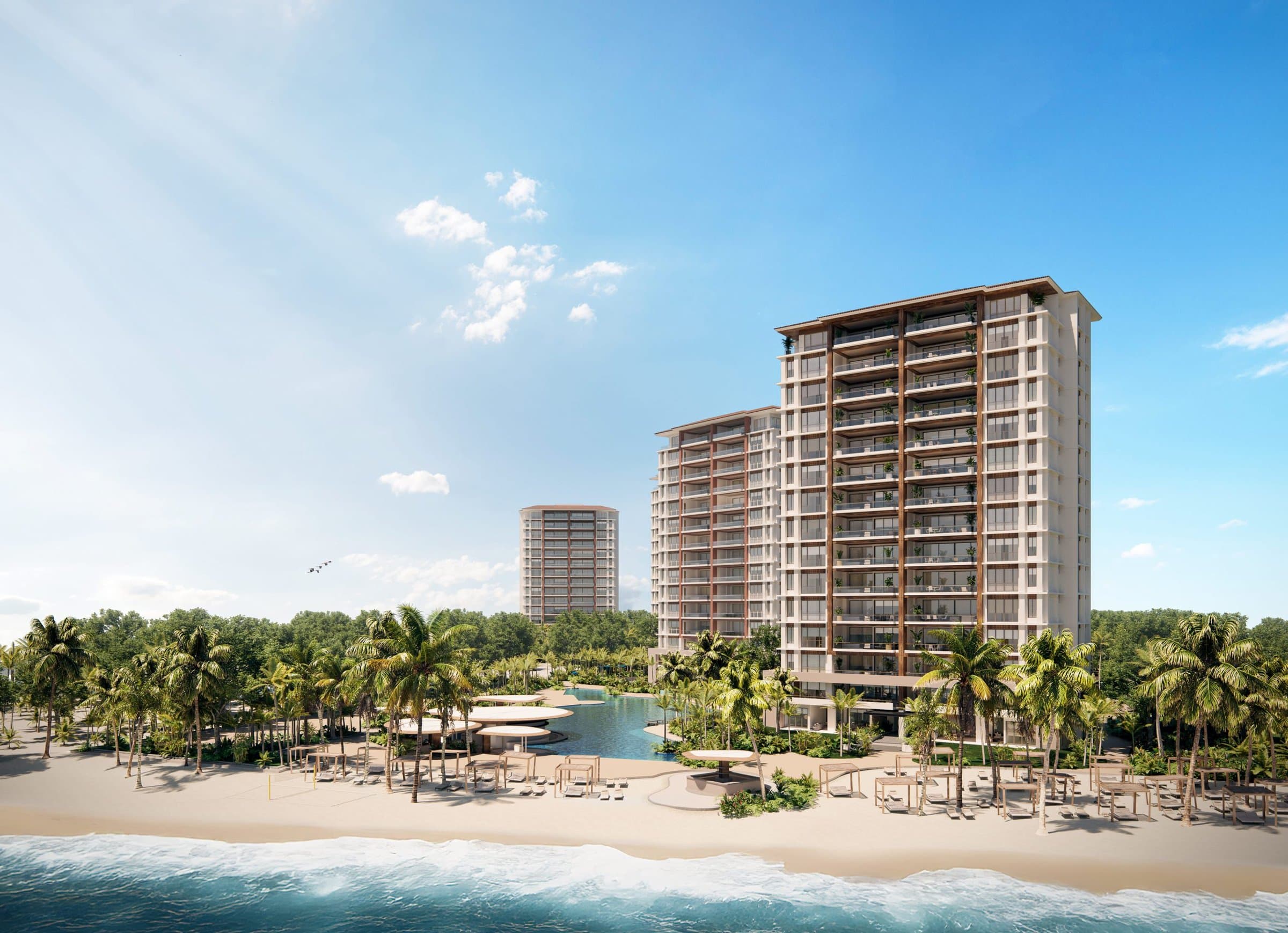 Alamar towers seen from the beach with pool gardens at Buenaventura on the Pacific coast