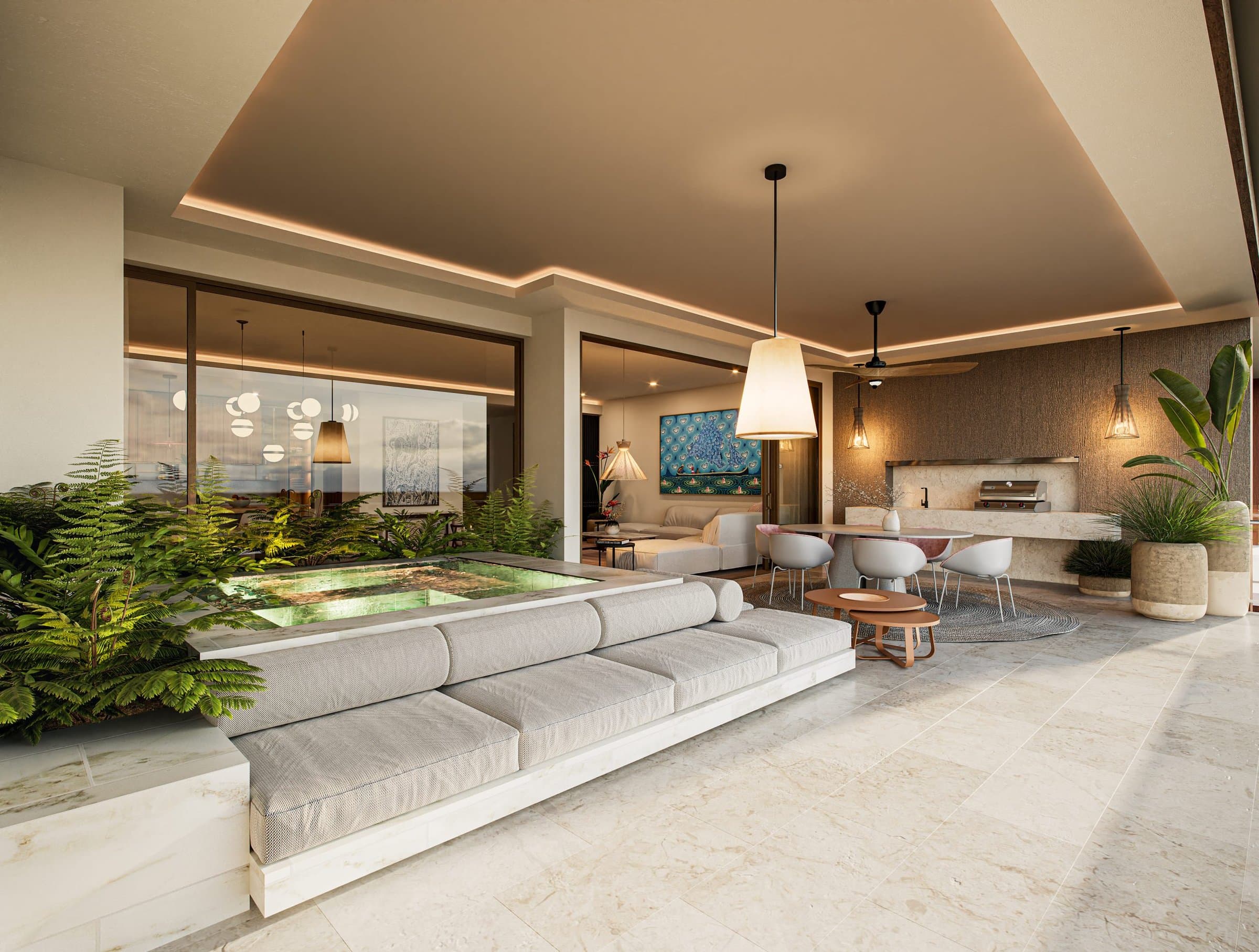 Covered terrace lounge with ocean view in an Alamar residence