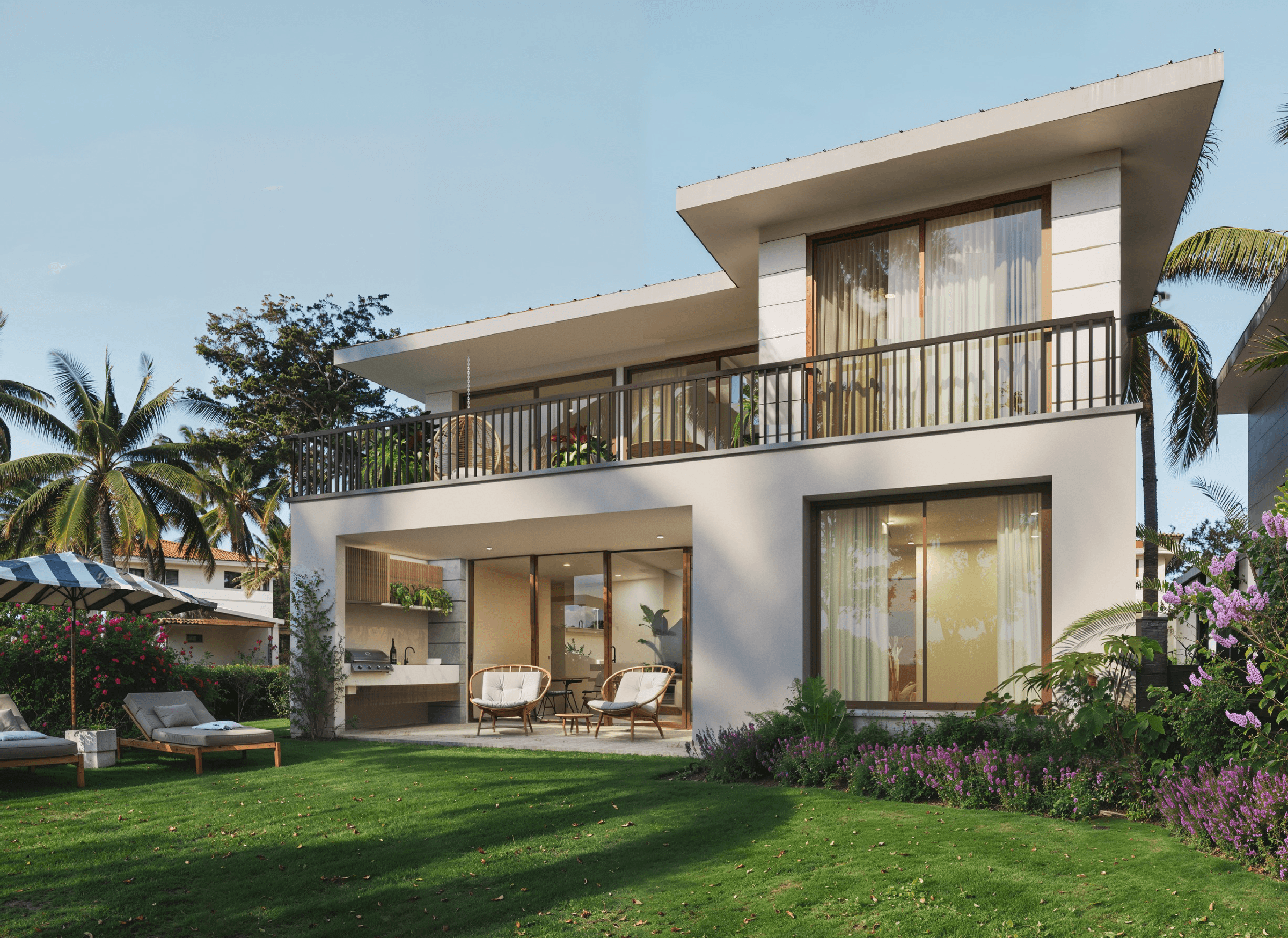 Rear facade of a Venao Living house with balcony, terrace and garden lawn