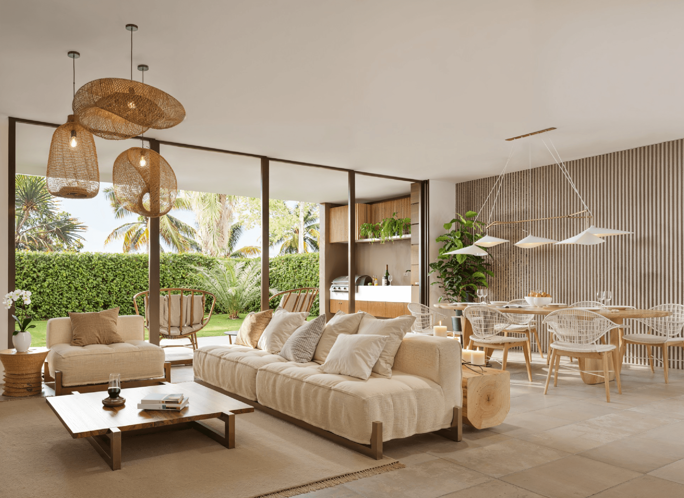 Open living and dining room opening onto the garden in a Venao Living house