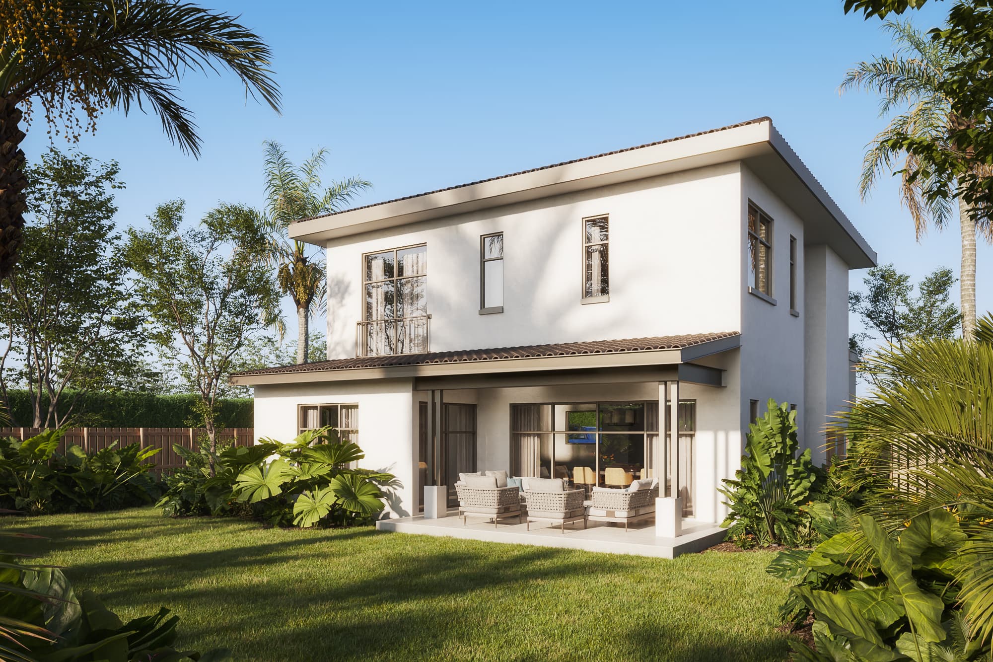 Rear garden and covered terrace of the El Remanso Serena model