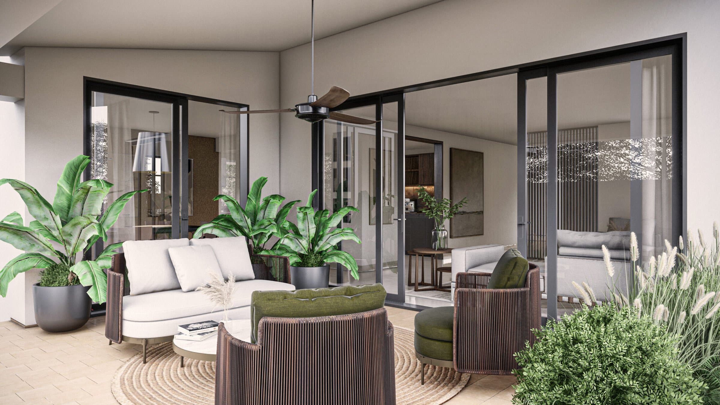 Covered terrace lounge with plants at an El Remanso house