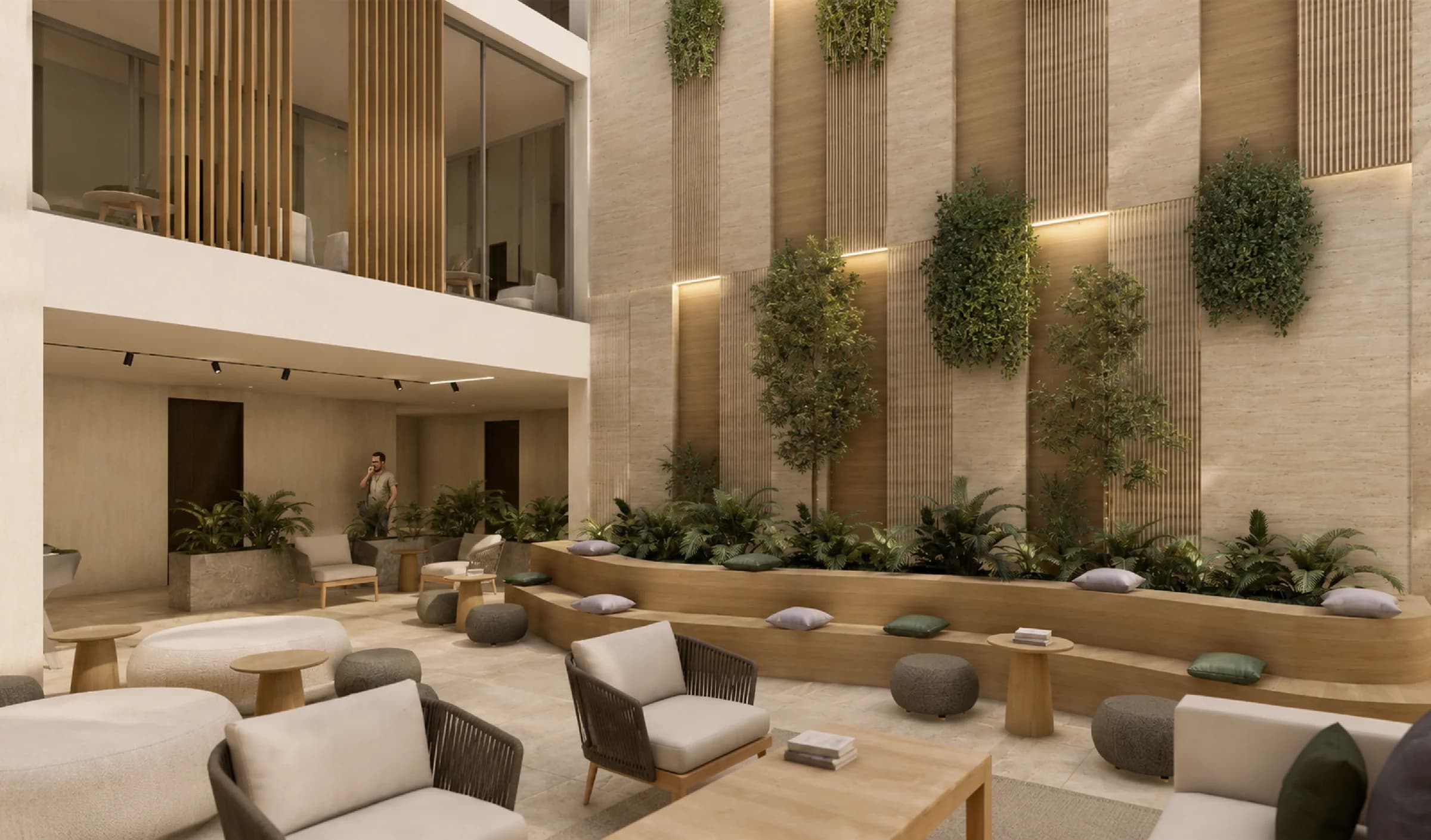Co-living lounge with green wall planters at The Edge Marbella