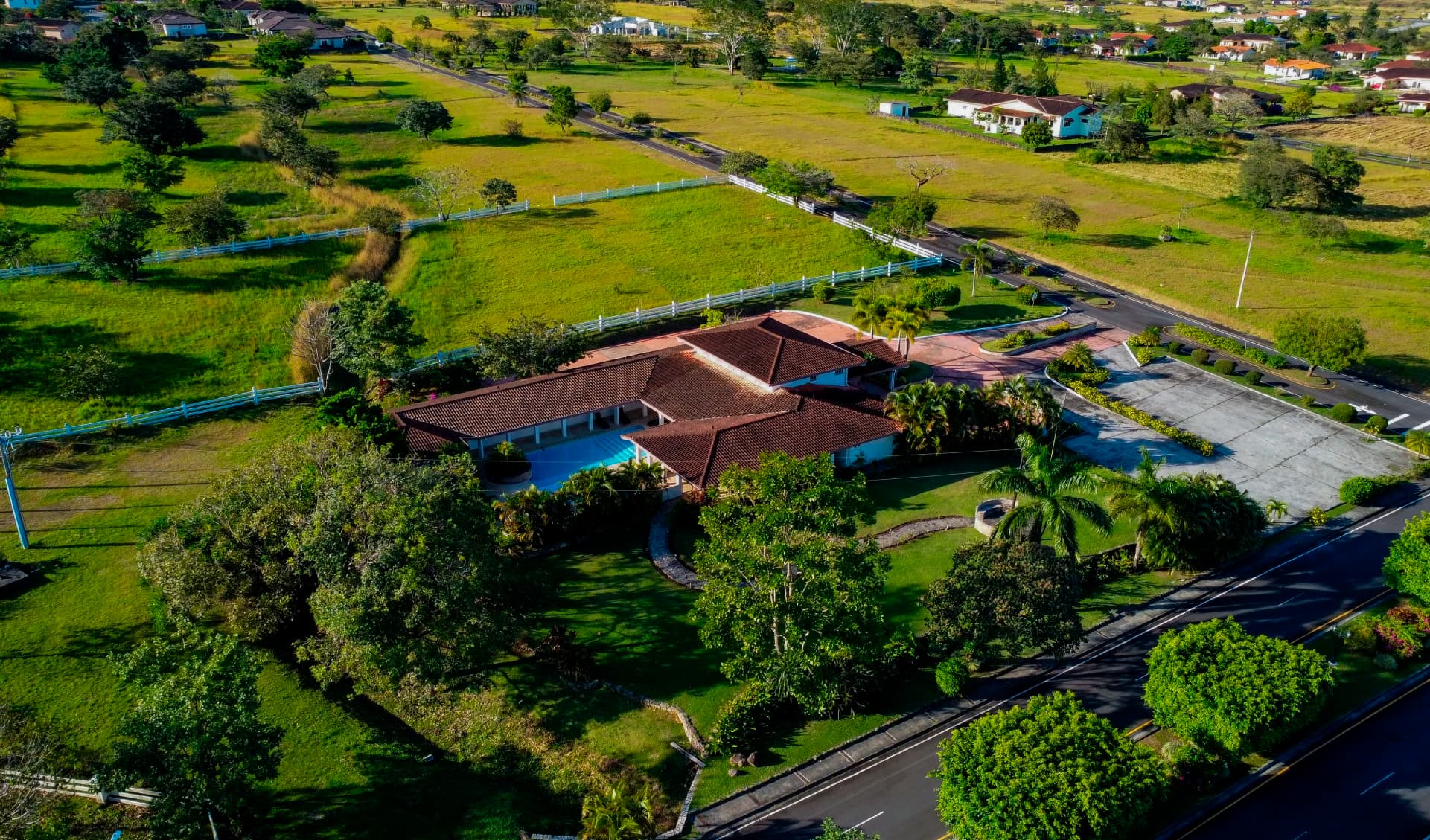 Aerial view of Boquete Canyon Village with the clubhouse pool and surrounding lots