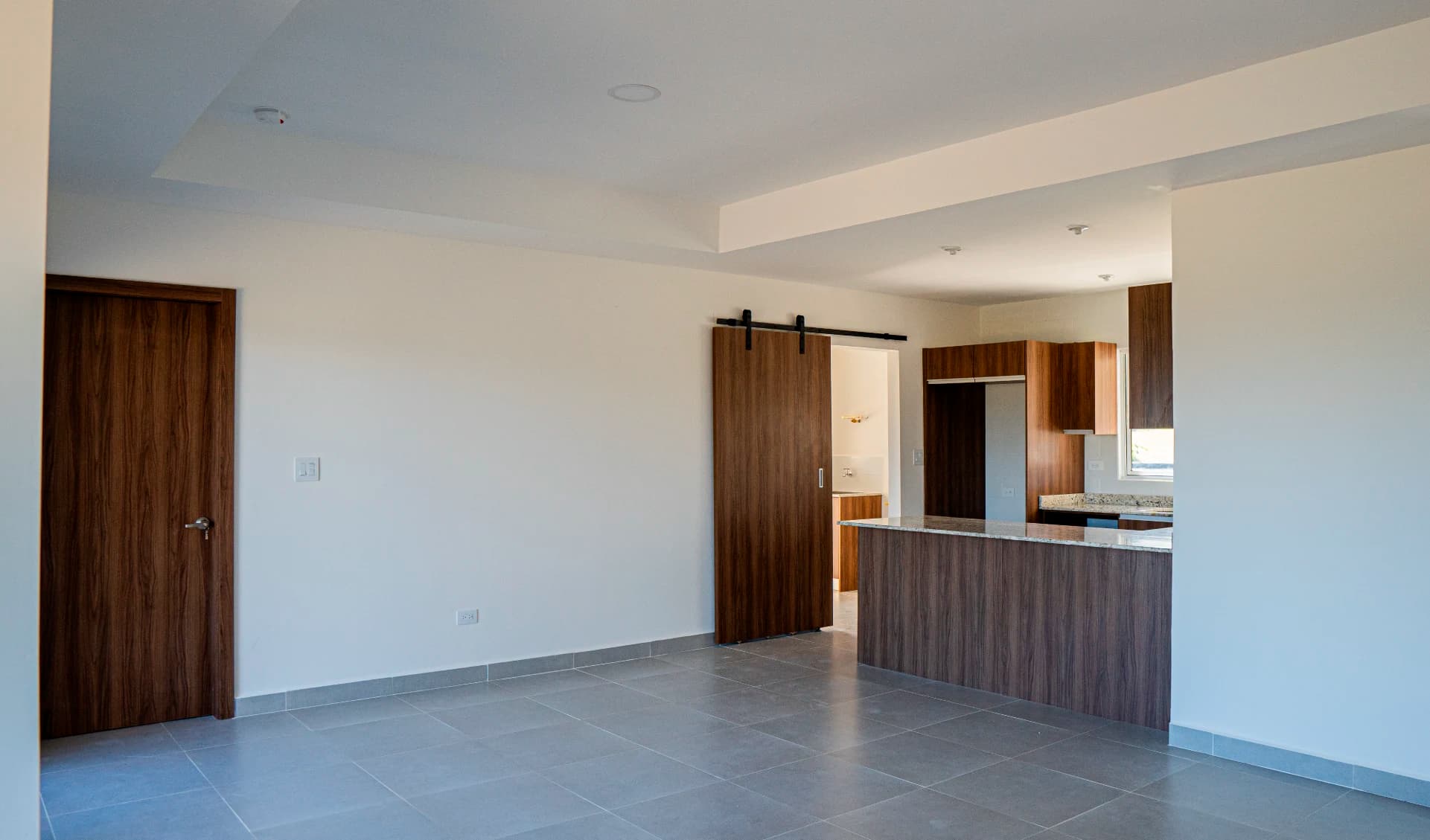 Open living area and kitchen in a Boquete Canyon Village house