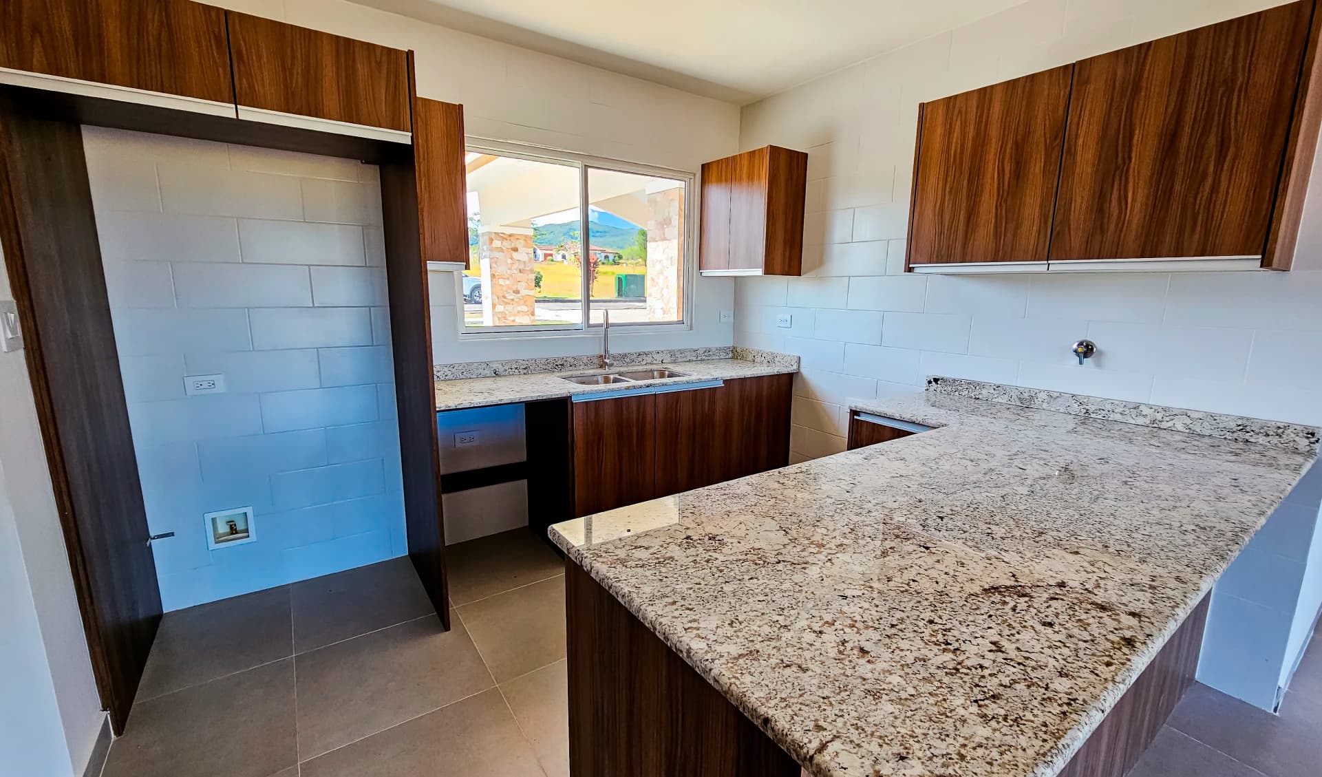Kitchen with granite countertops in a Boquete Canyon Village house