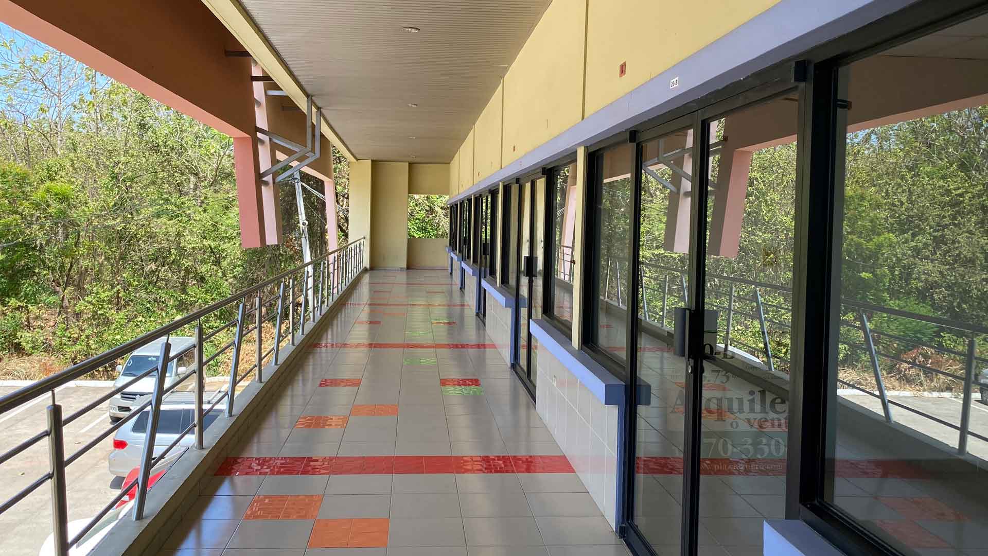Second-floor walkway along the commercial suites at Plaza Azuero