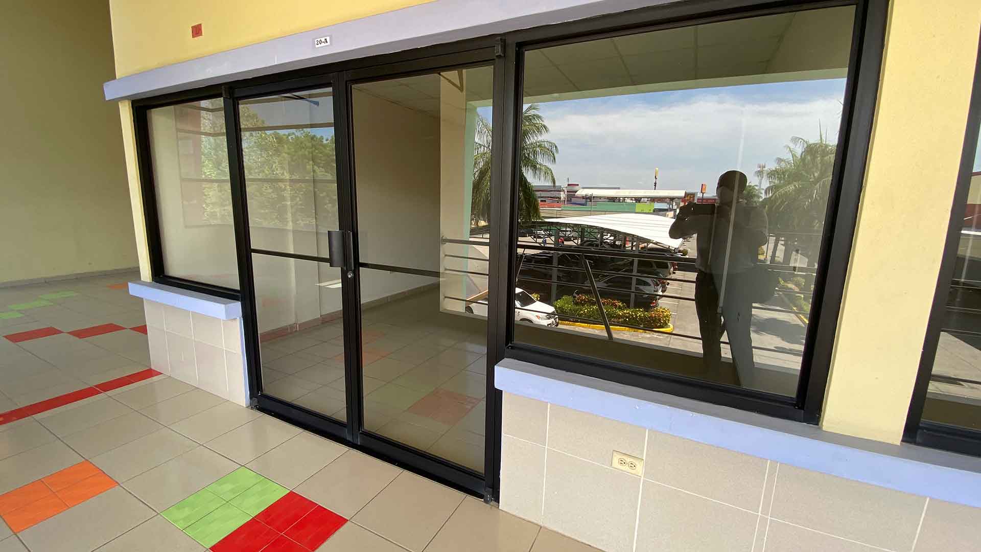 Glass storefront of an available commercial suite at Plaza Azuero