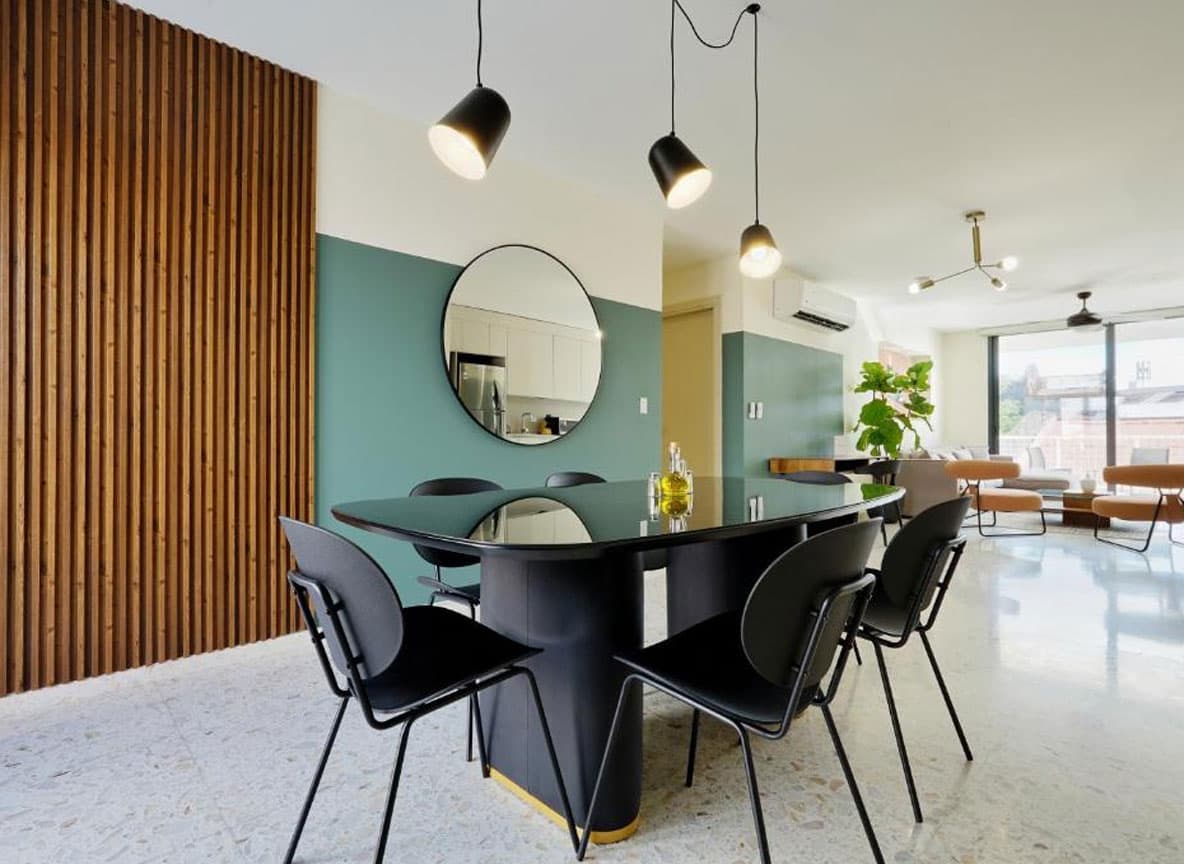 Dining area with pendant lights in a La Moderna apartment