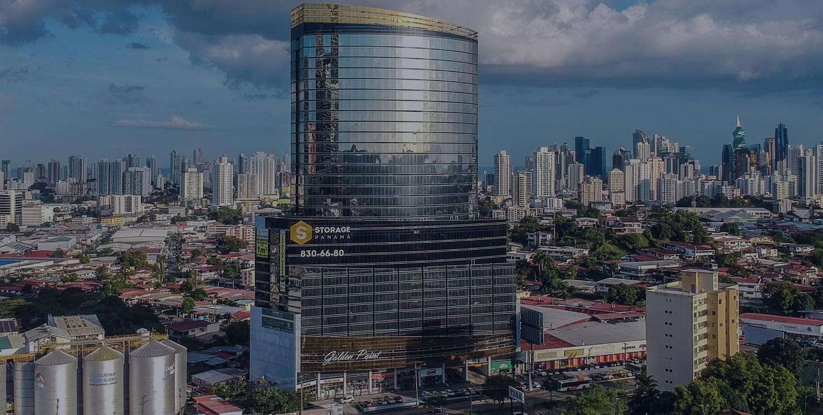 Aerial view of Golden Point Tower against the Panama City skyline
