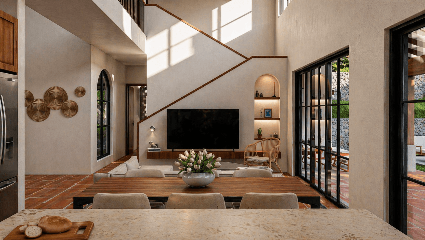 Double-height living and dining room of a villa at Venao Cove
