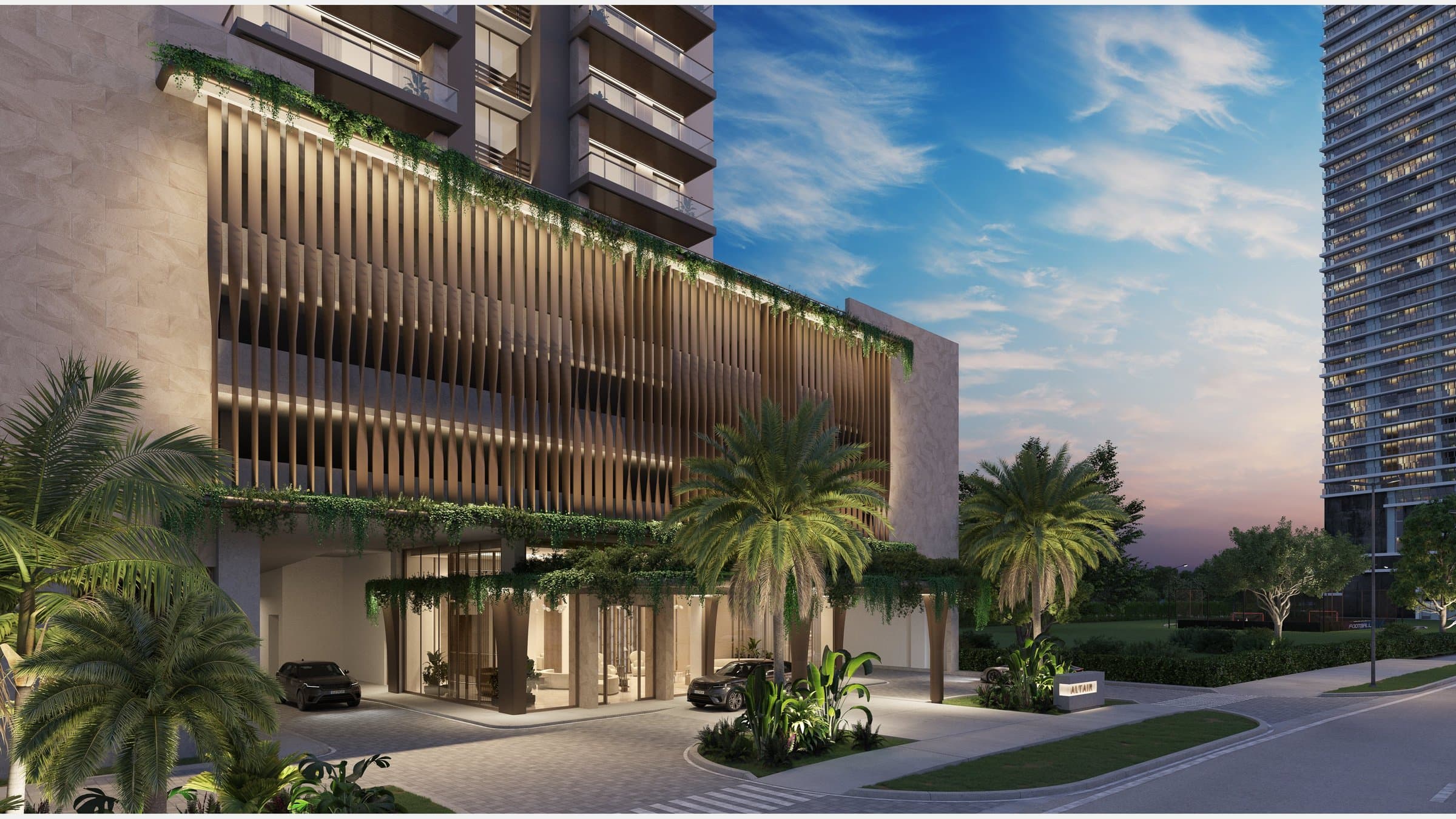 Landscaped entrance and drop-off of Torre Altair in Santa Maria