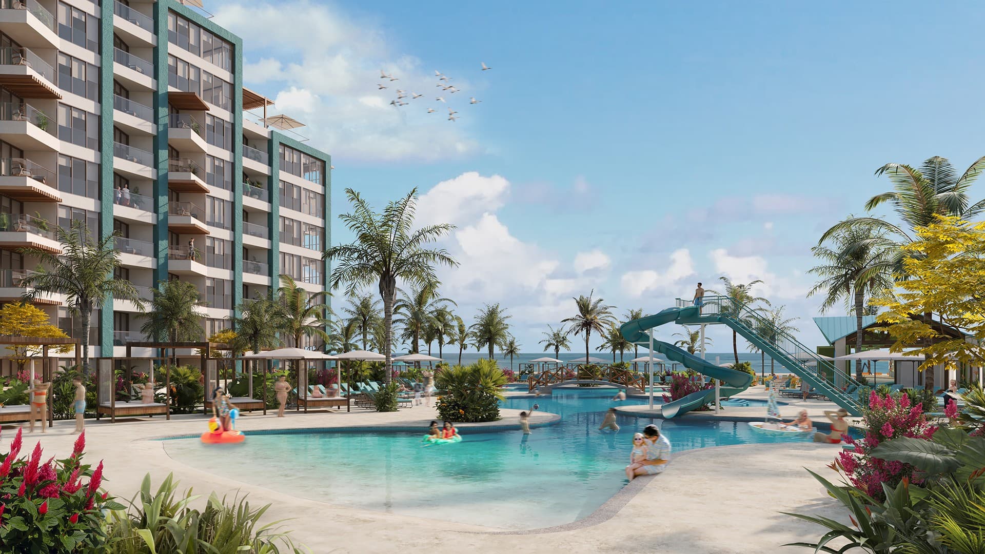 Lagoon pool with waterslides at Margaritaville Beach Resort & Residences Playa Caracol