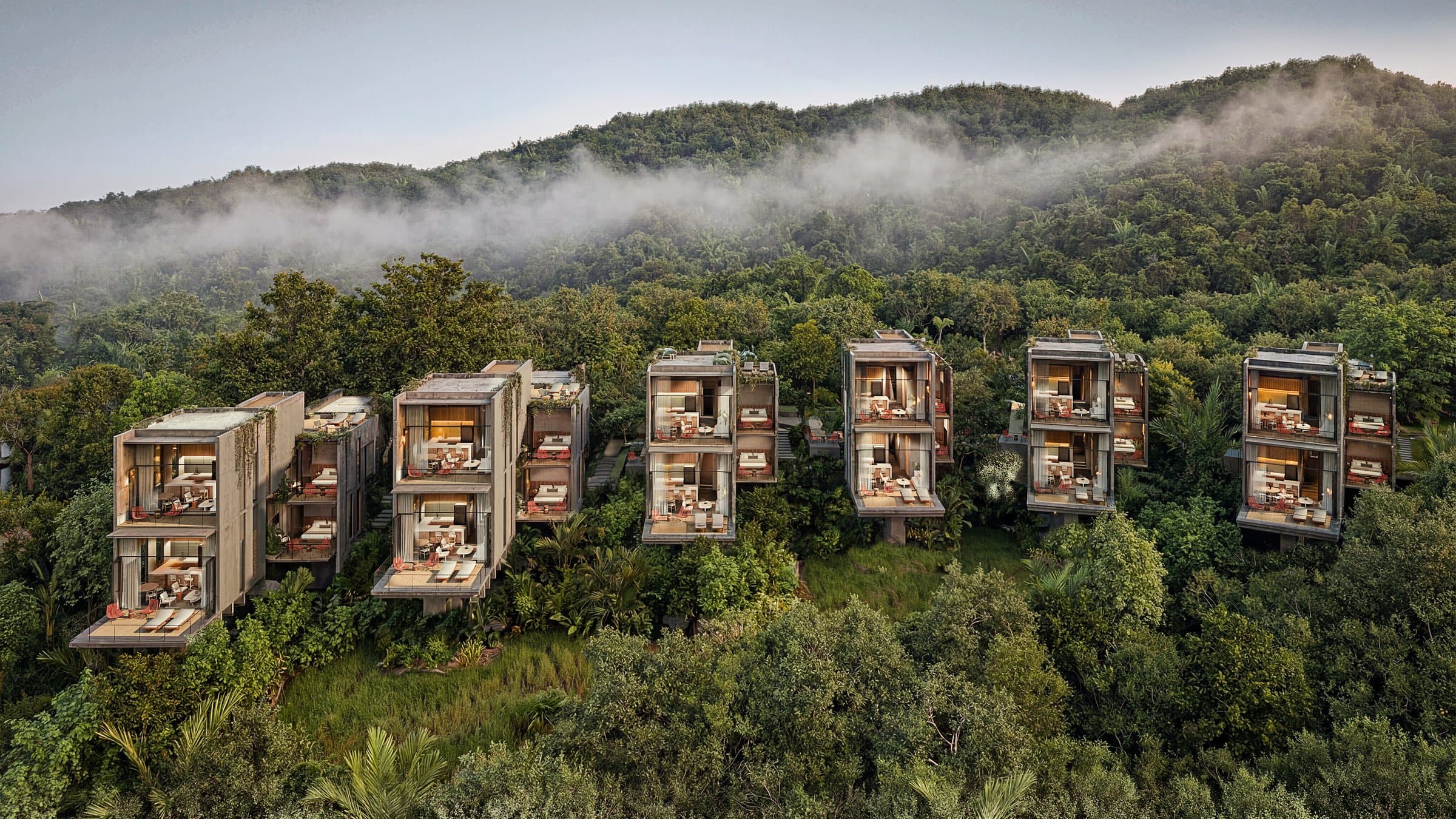 Aerial view of the four boutique towers of Vervana Phase II Templo in the jungle canopy