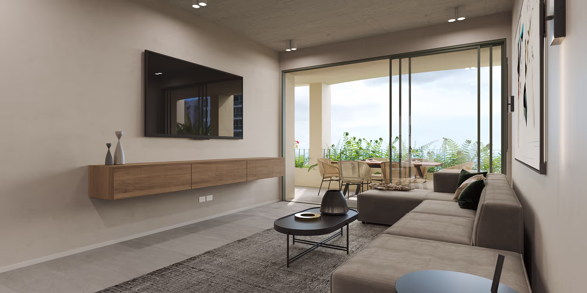Living room opening onto the balcony in an A19 Cincuentenario apartment