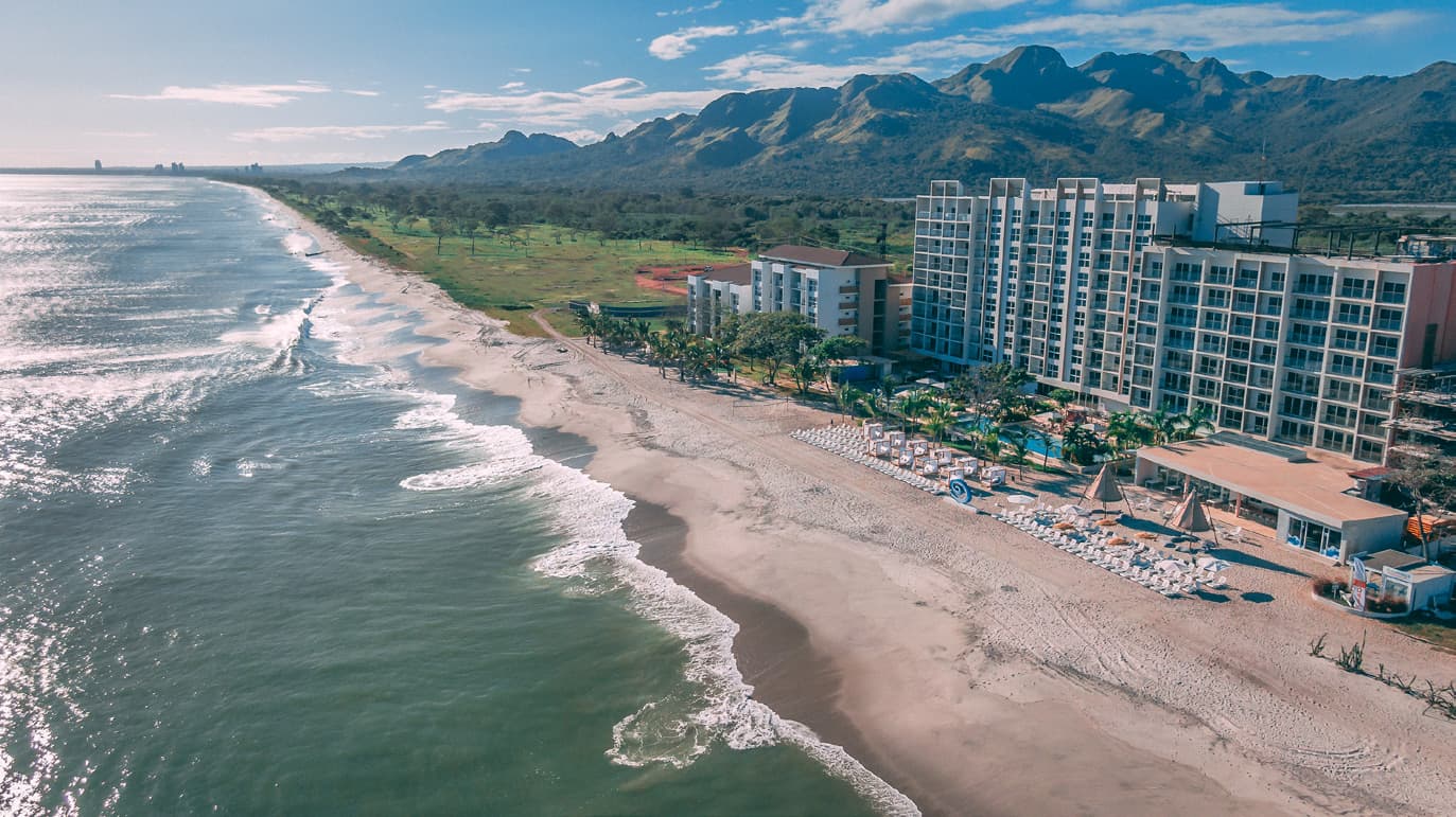 Aerial view of the Playa Caracol beach where Seashore Beachfront Villas is located
