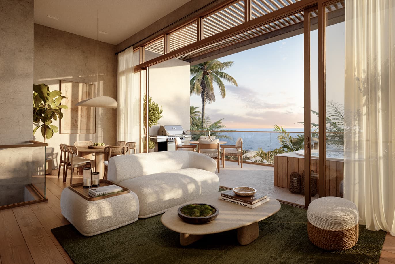 Living room opening to the terrace at Seashore Beachfront Villas