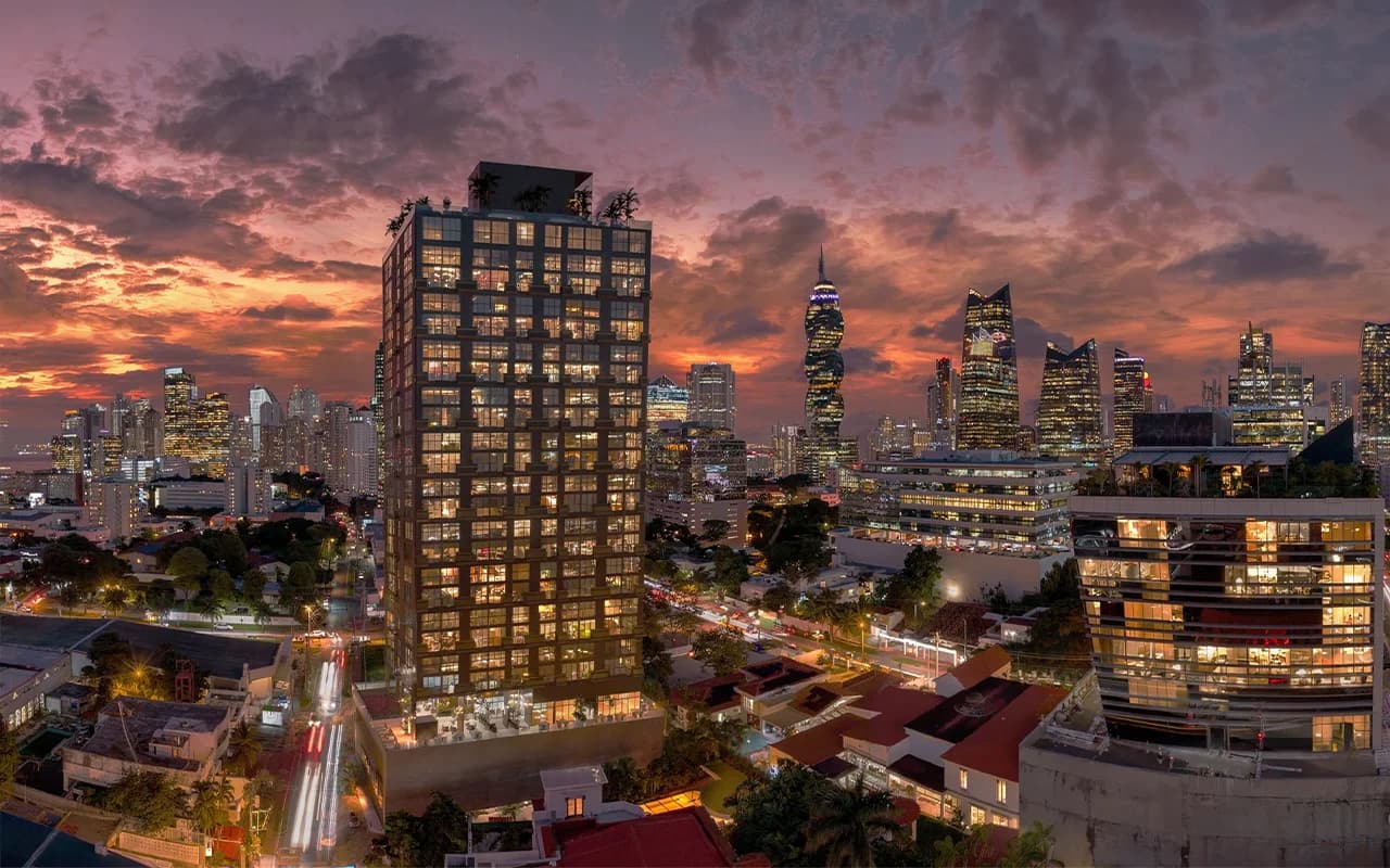 Dusk aerial render of The Label by Loft Obarrio and the Panama City skyline