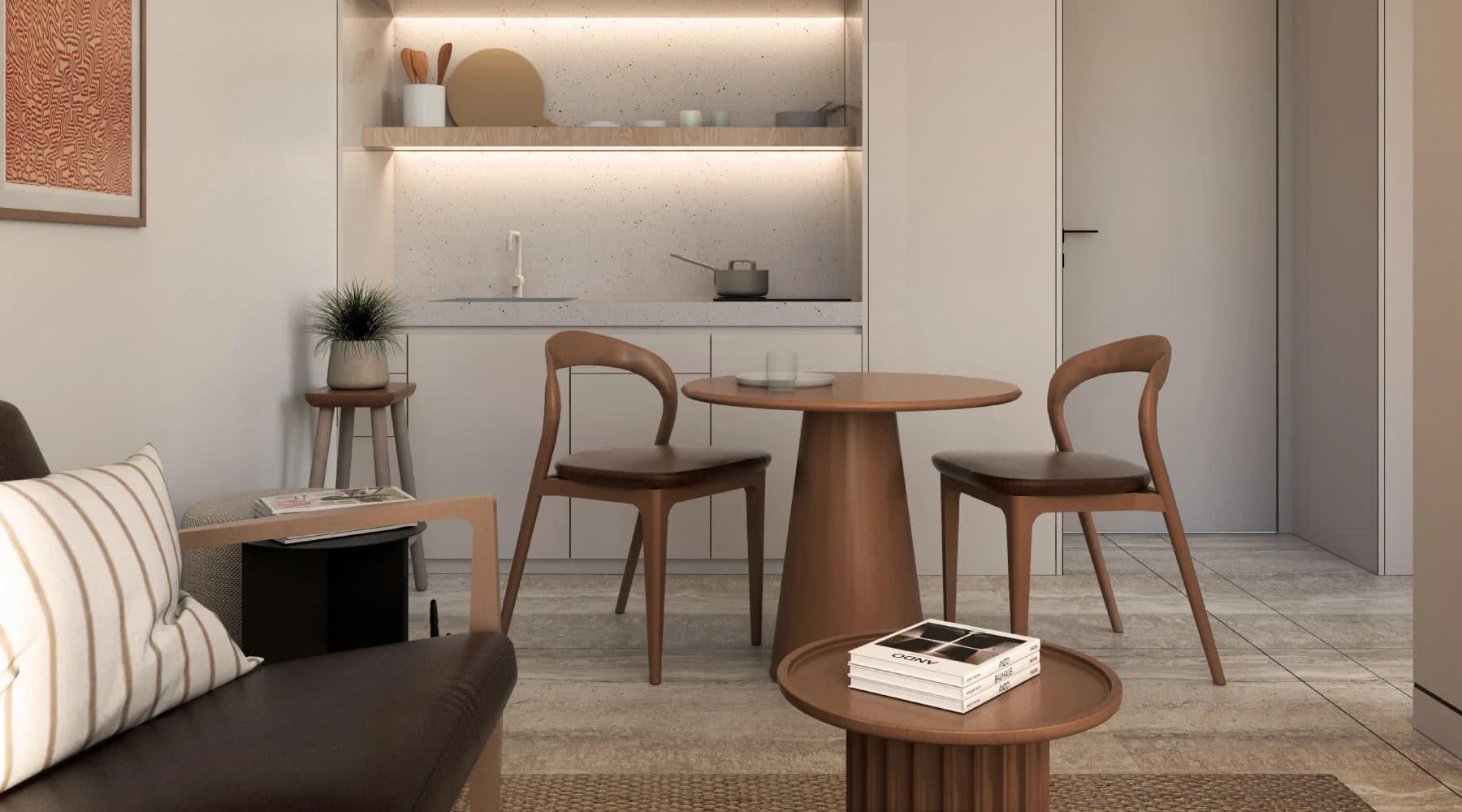 Dining table and kitchenette in an apartment at Paly