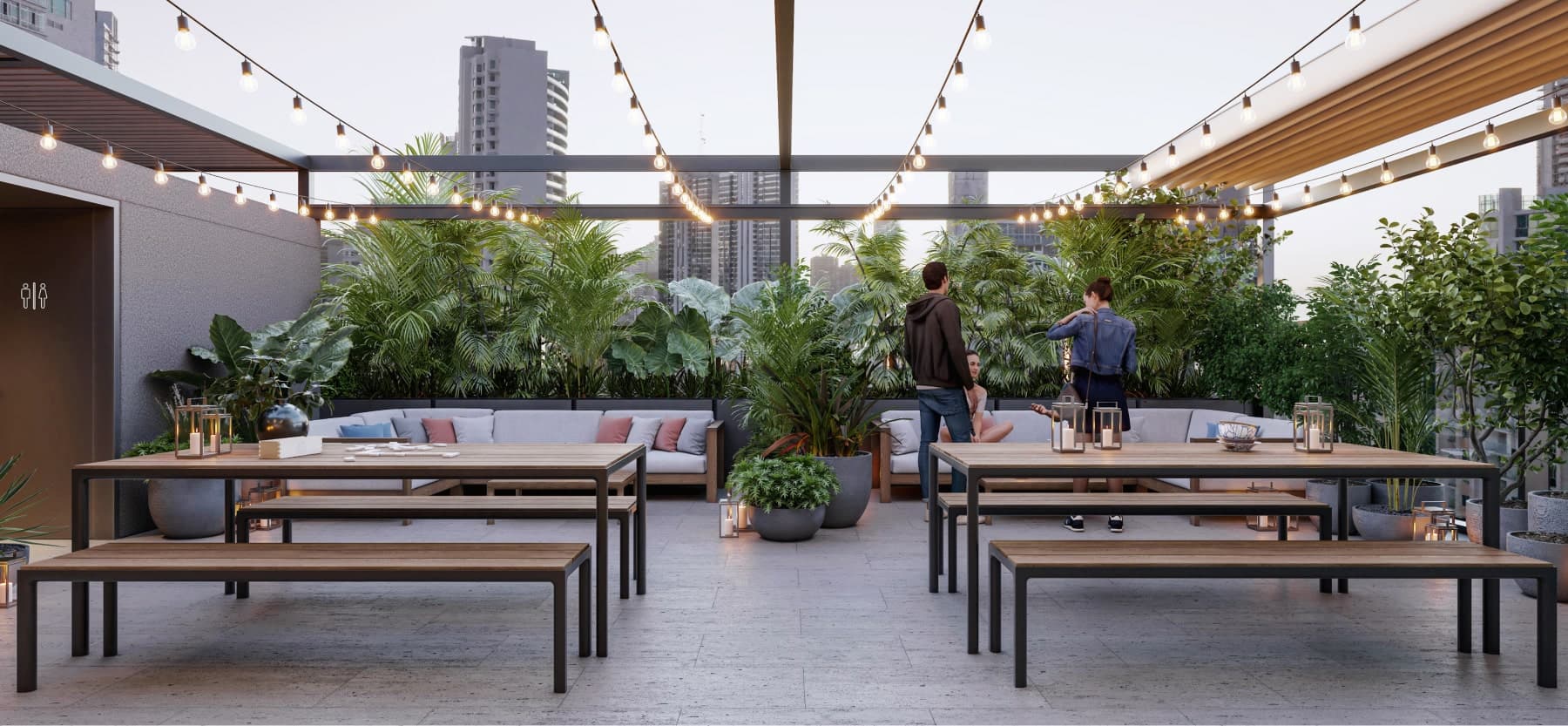Rooftop dining terrace with communal tables at APTTA