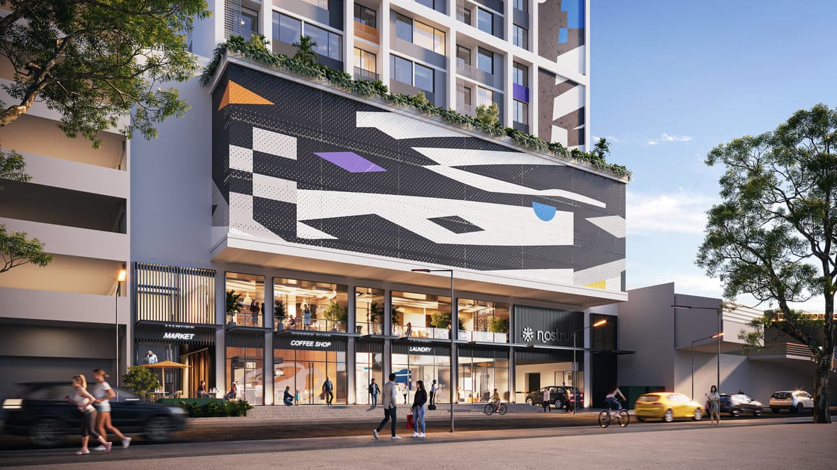 Street-level view of the Nostrum tower and its art-covered podium