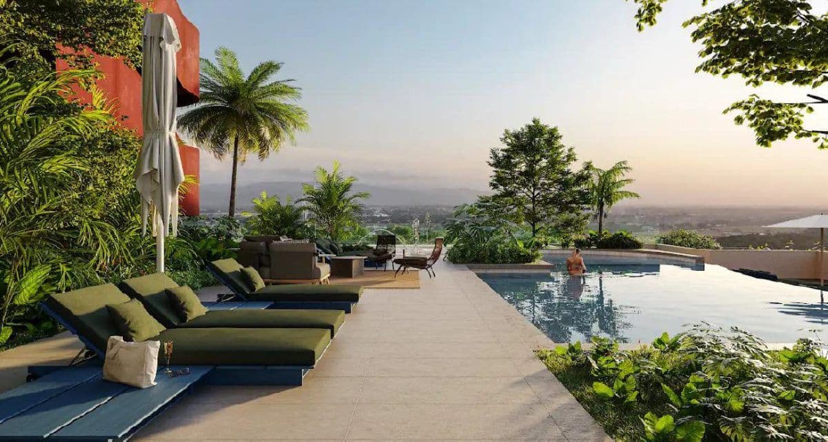 Rooftop pool and sun loungers overlooking Santa Maria at Éleve