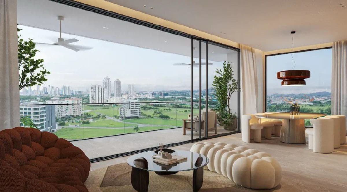 Living room of an Éleve apartment with a terrace facing the Santa Maria golf course