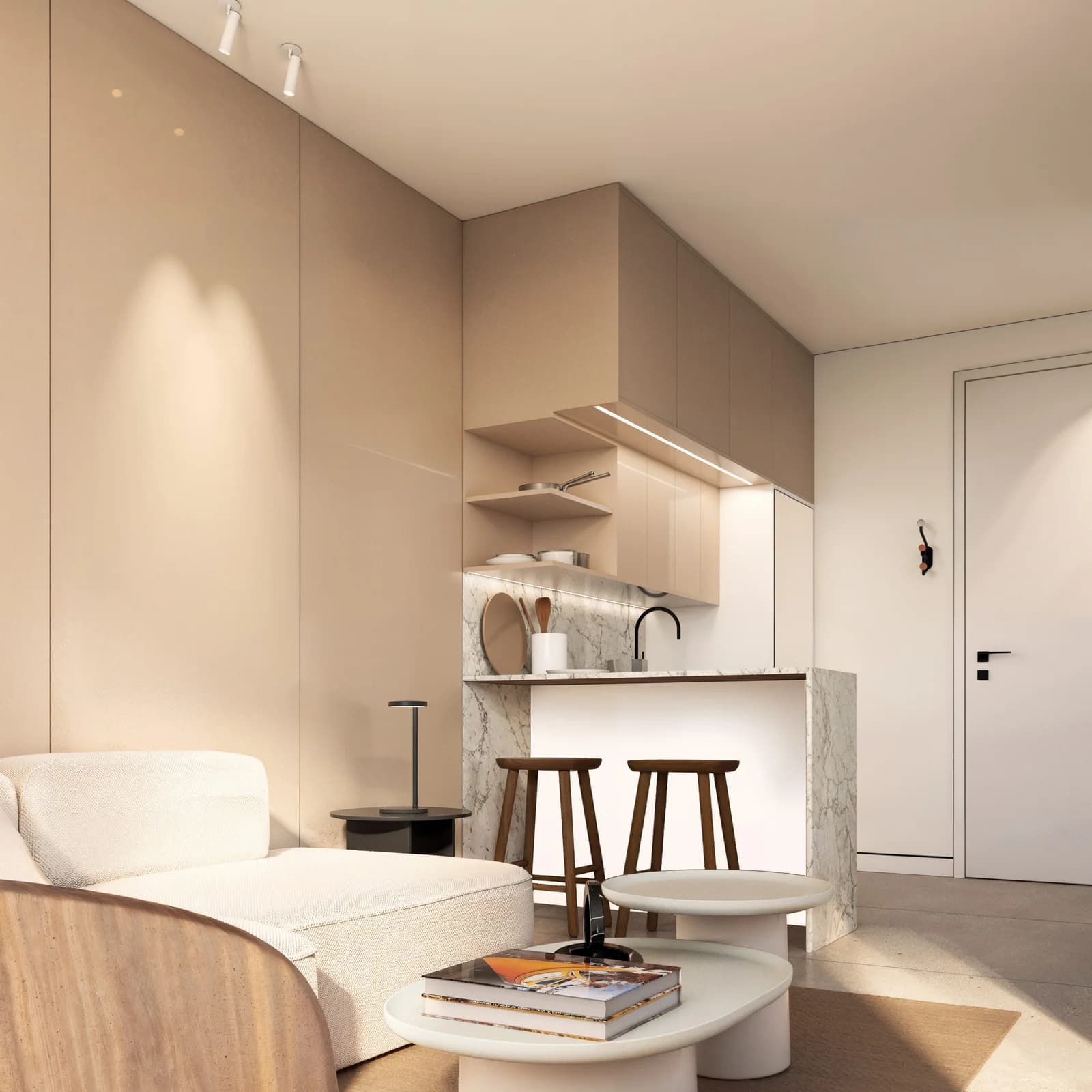Kitchen and living area of a studio at KYTE by Living