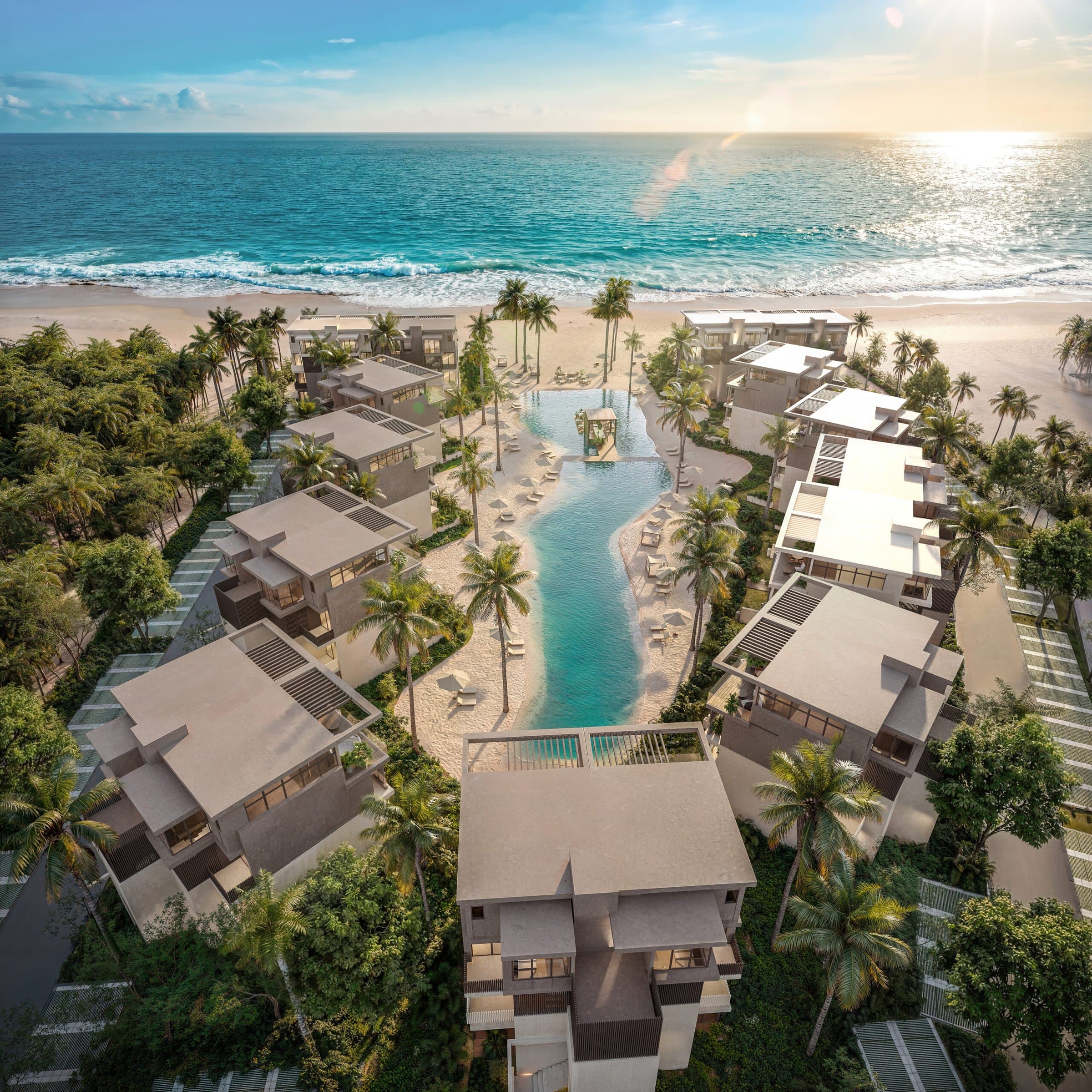 Aerial view of the lagoon pool and houses of Seashore Reserve facing the Pacific