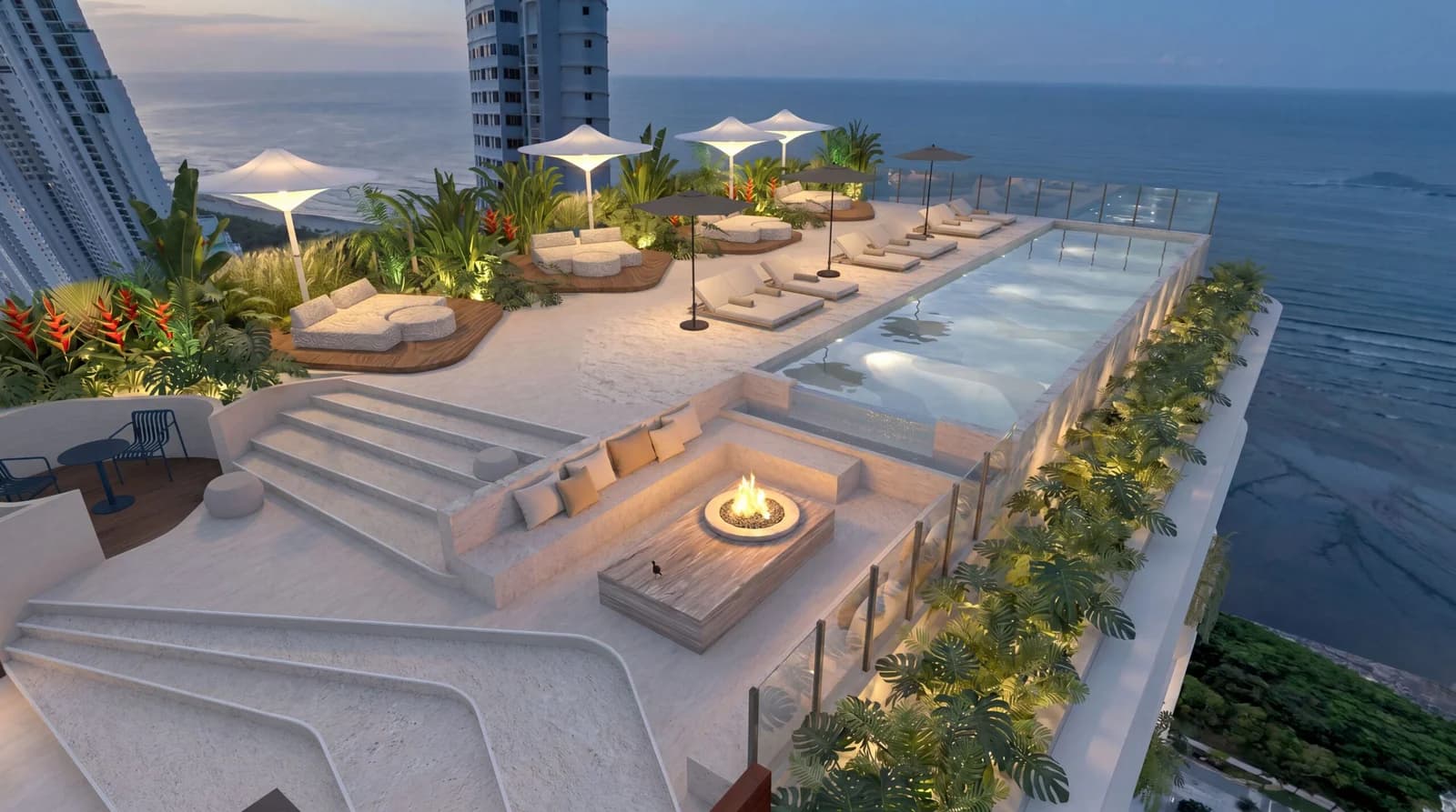 Rooftop pool deck with fire pit and lounges at Selvática Residences