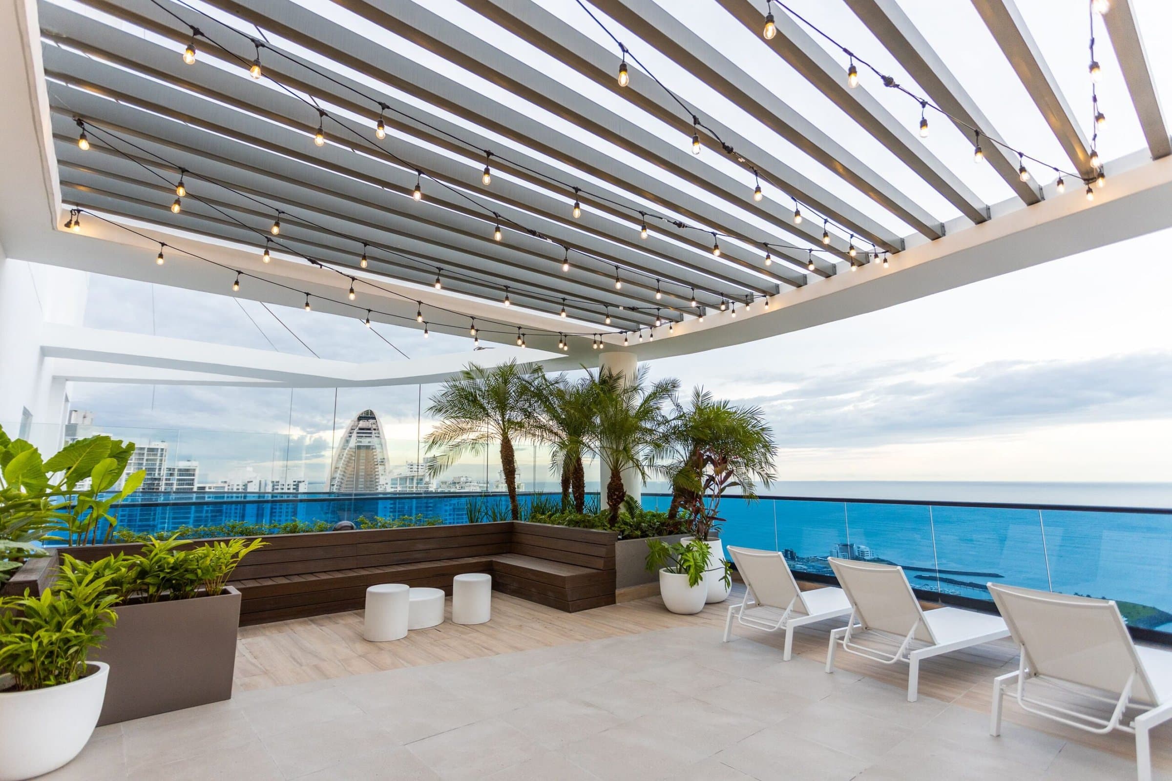 Ocean Front rooftop terrace with pergola, loungers and Pacific Ocean views