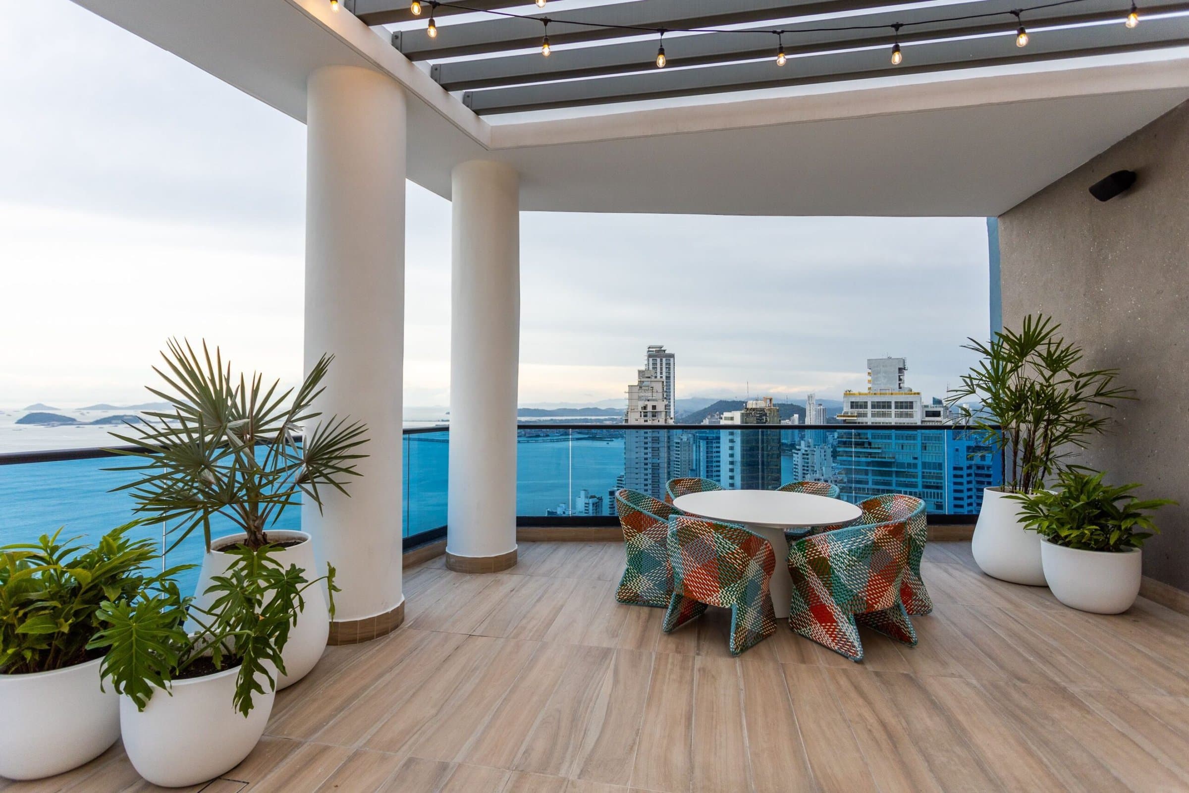 Ocean Front covered terrace with dining table and ocean views