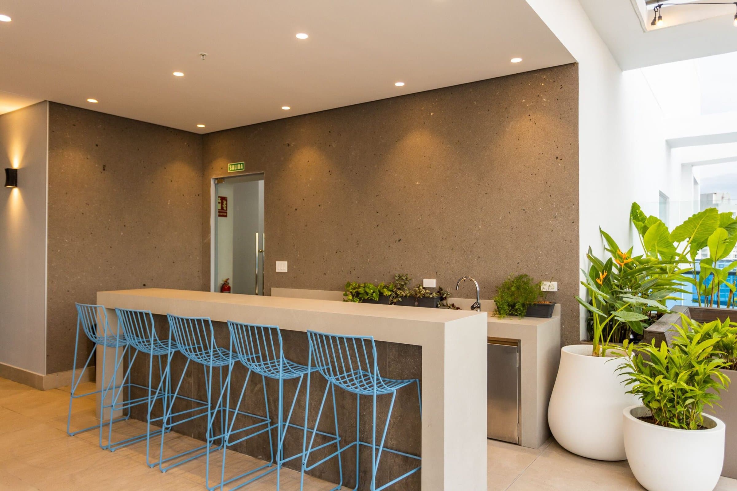 Ocean Front chef's kitchen bar with counter stools in the social area