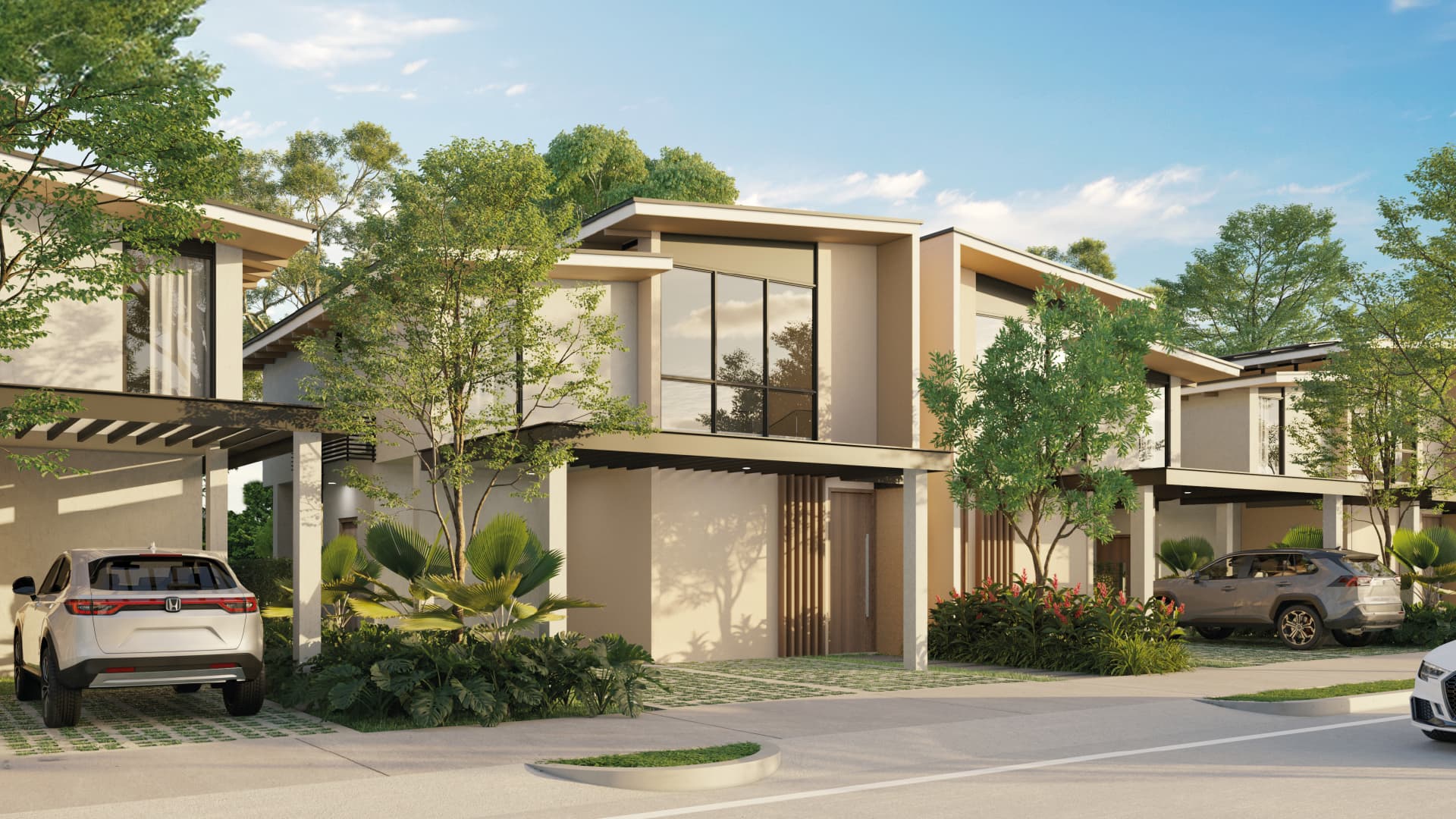 Vida two-story houses with carports along a landscaped street in Green City